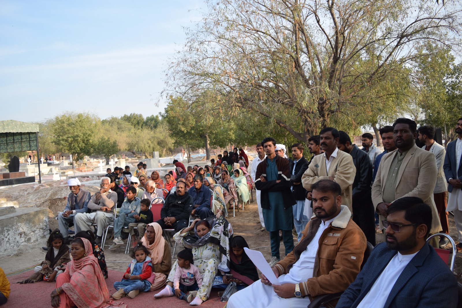 Villagers gather in the Khushpur cemetery for prayers for the departed and the village’s martyrs during closing observances of the 125th jubilee on Feb. 8, 2026. | Credit: Ijaz Bhatti