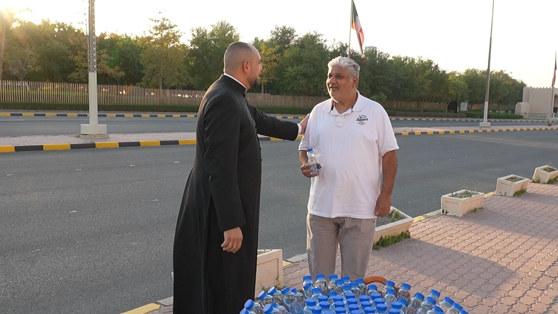 The Catholic Church in Kuwait launched an initiative to distribute dates and water to fasting Muslim passersby before their iftar meal at sunset. | Credit: Photo courtesy of the Apostolic Vicariate of Northern Arabia