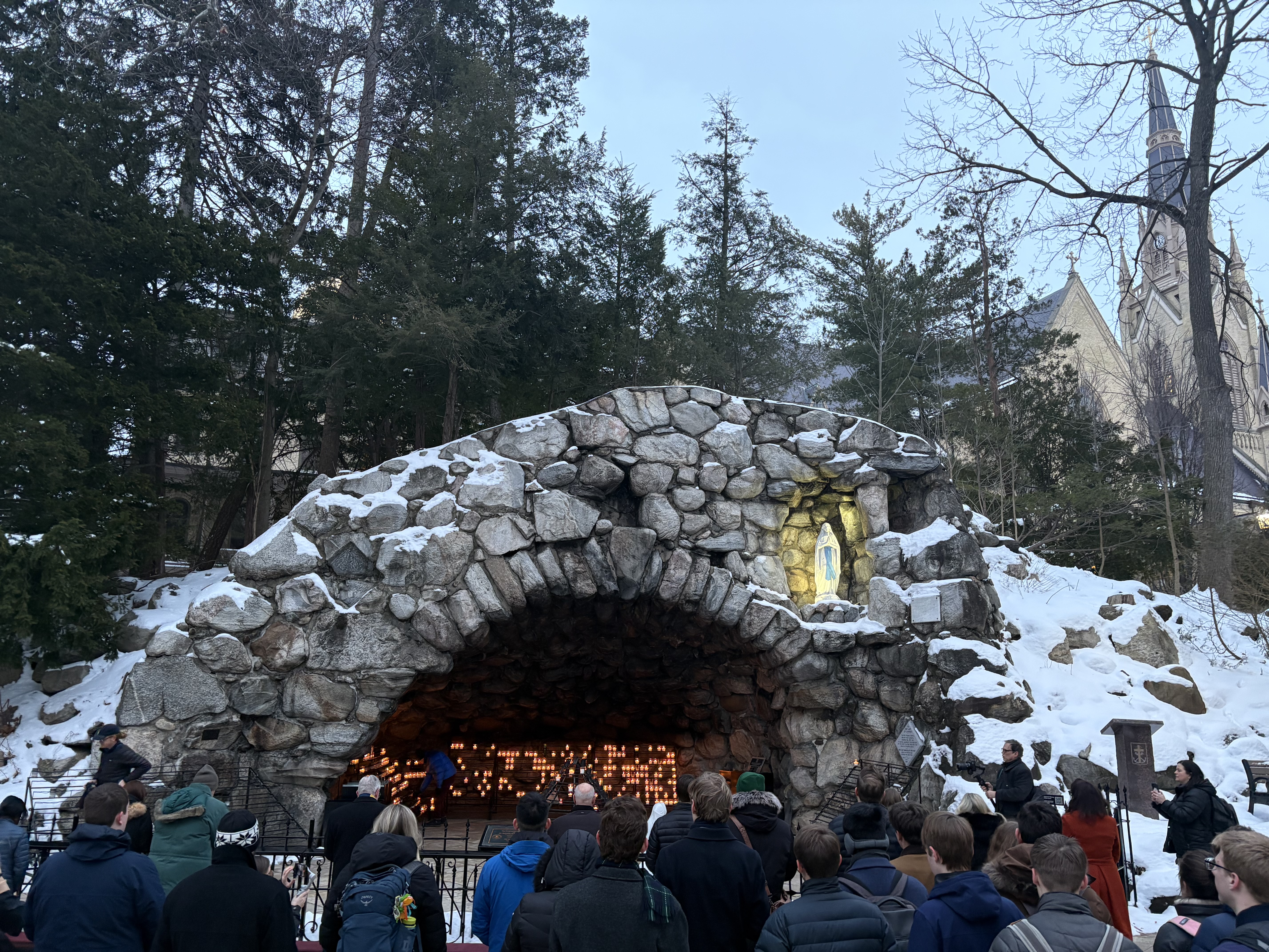 Bishop Kevin Rhoades of Fort Wayne-South Bend, Indiana, leads a crowd of about 50 in praying the rosary at the Grotto of Our Lady of Lourdes on the campus of the University of Notre Dame on Feb. 24, 2026. | Credit: Jonathan Liedl
