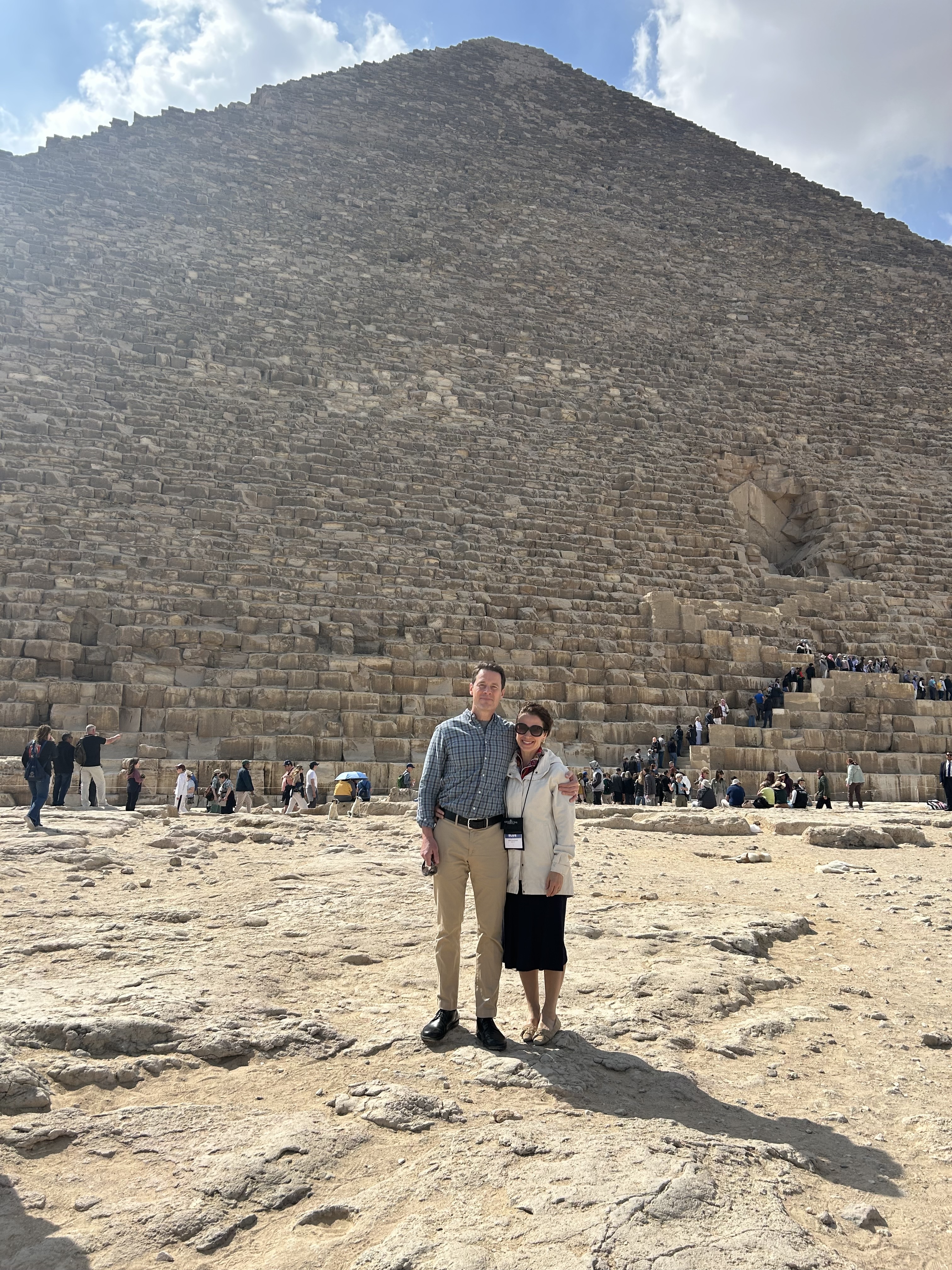 Father Albert and Abby Scharbach stand at the Great Pyramid of Giza outside of Cairo on Sunday, March 1, 2026. | Credit: Photo courtesy of Father Albert and Abby Scharbach