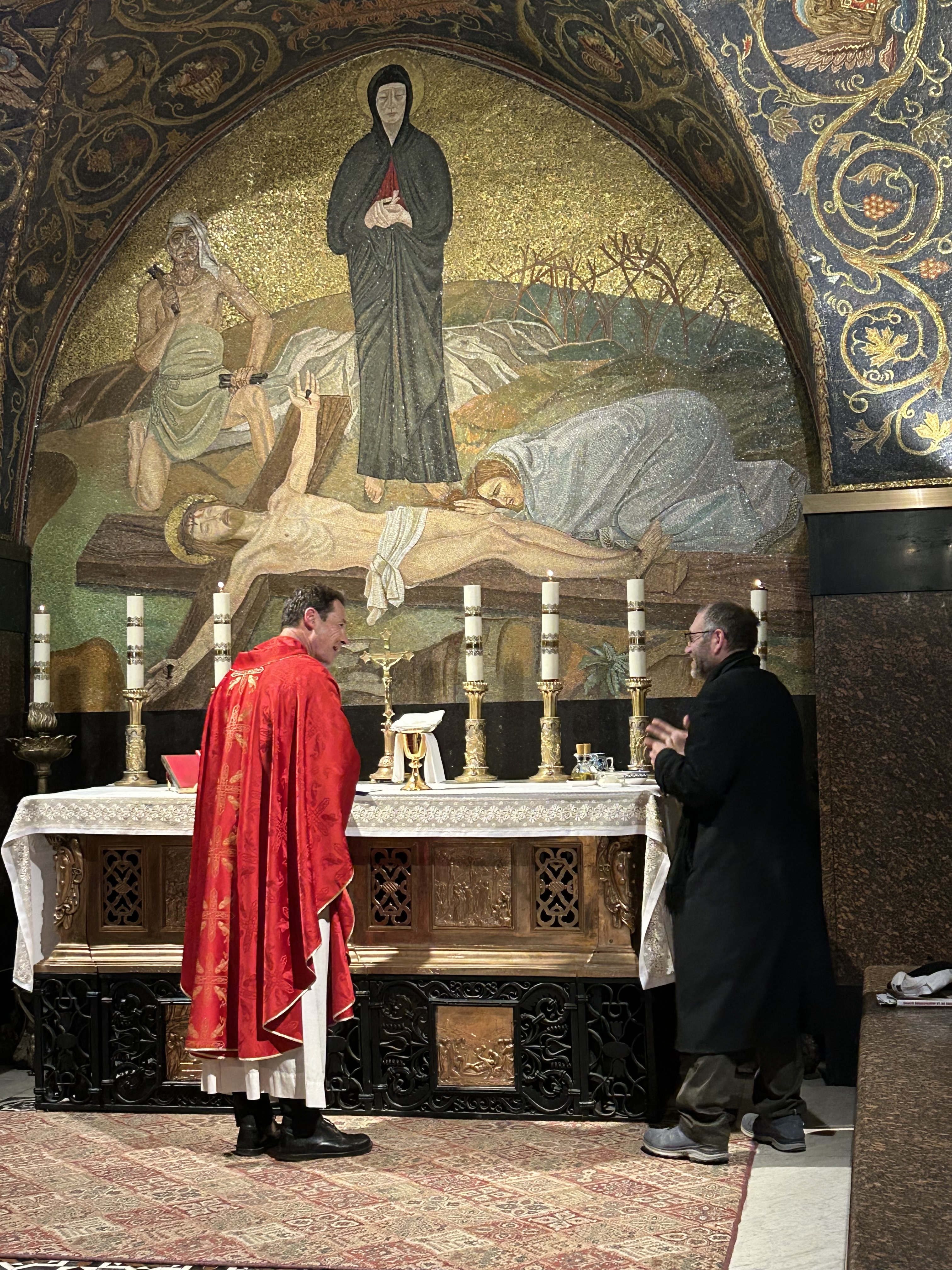 Father Albert Scharbach stands at the altar of the Latin Calvary Chapel at the Church of the Holy Sepulchre in Jerusalem, Thursday, Feb. 26, 2026. | Credit: Photo courtesy of Father Albert and Abby Scharbach