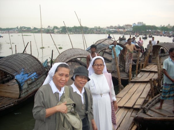 Sister Zita Rema (pictured on the right) and two other sisters travel by boat to conduct pastoral work in Chattogram. | Credit: Photo courtesy of Sister Zita Rema