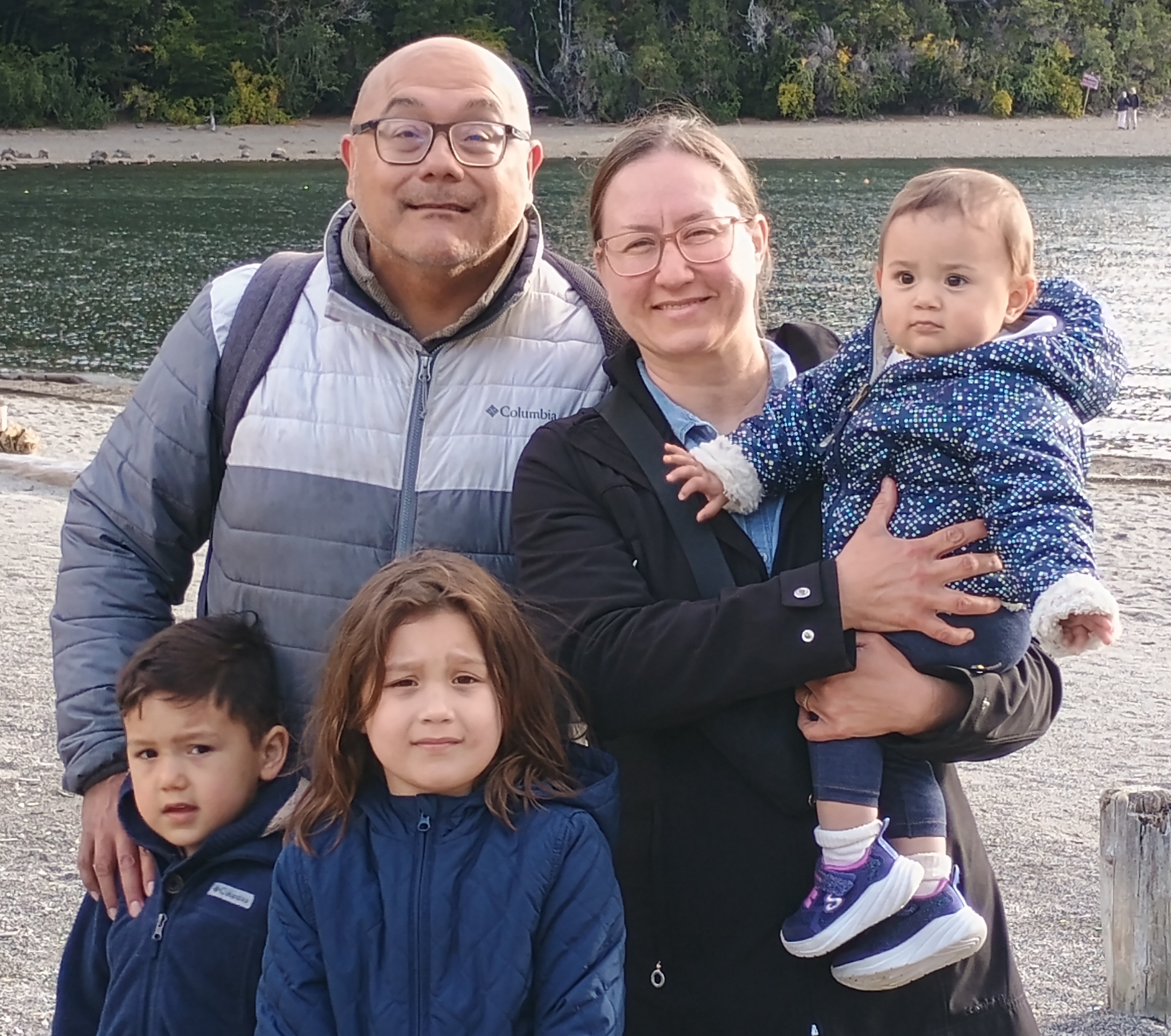 Jillian Bernas Garcia (center) is leading a coalition of parents striving to keep their local Catholic school open by appealing to the Vatican. She is pictured above with her husband, Angel, and their three children. | Credit: Photo courtesy of Jillian Bernas Garcia