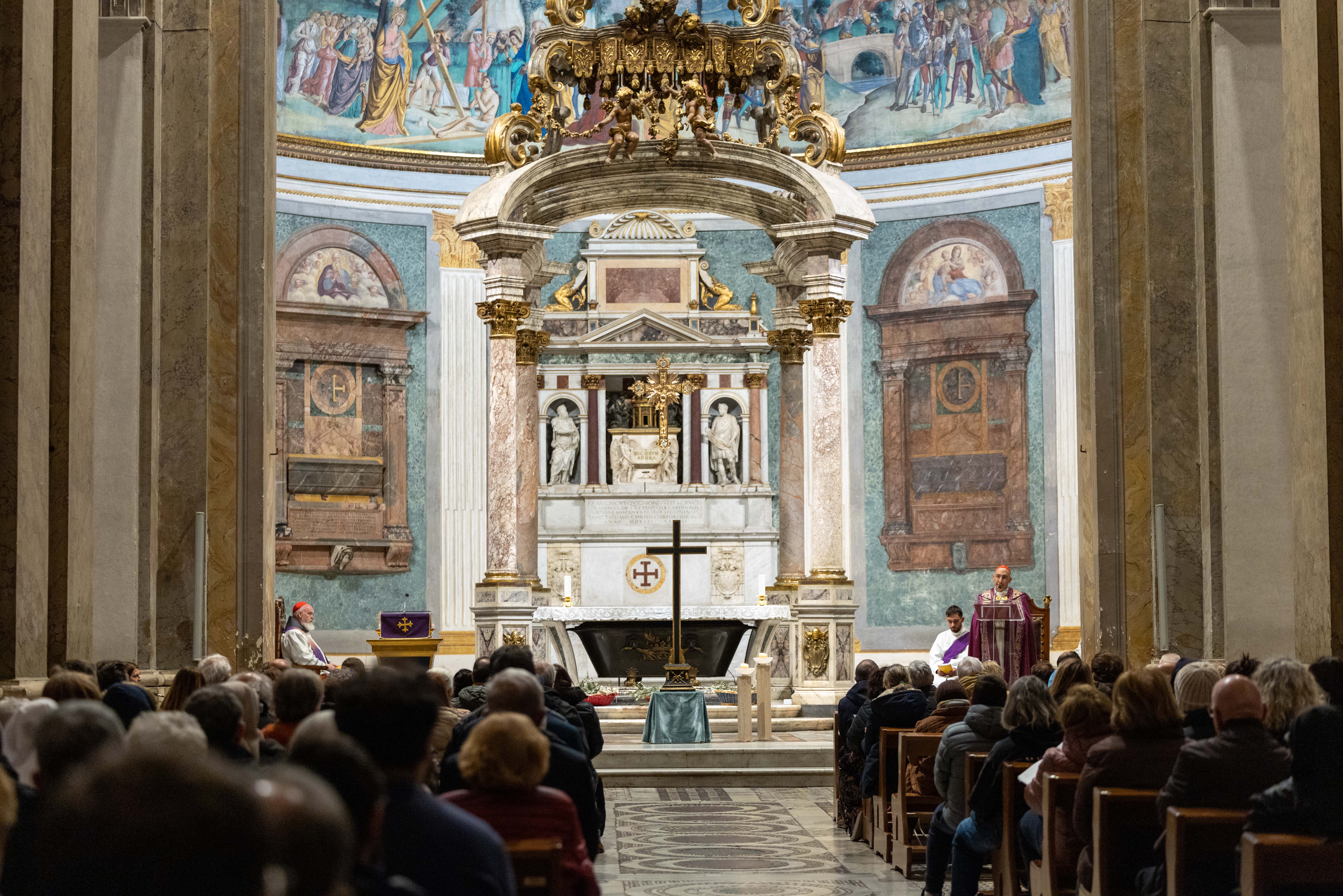 The prayer vigil was presided over by Cardinal Baldassare Reina, vicar general for the Diocese of Rome, at the basilica, which houses ancient relics of the cross of Christ, on the first day of Holy Week. | Credit: Daniel Ibanez/EWTN News