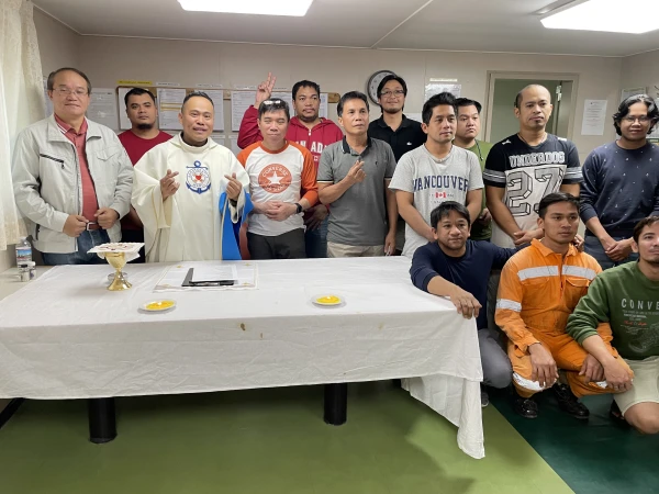 One of the priests of the Apostleship of the Sea celebrates Mass with sailors at the Stella Maris Mission in Hamburg Harbor. | Credit: Dicastery for Promoting Integral Human Development