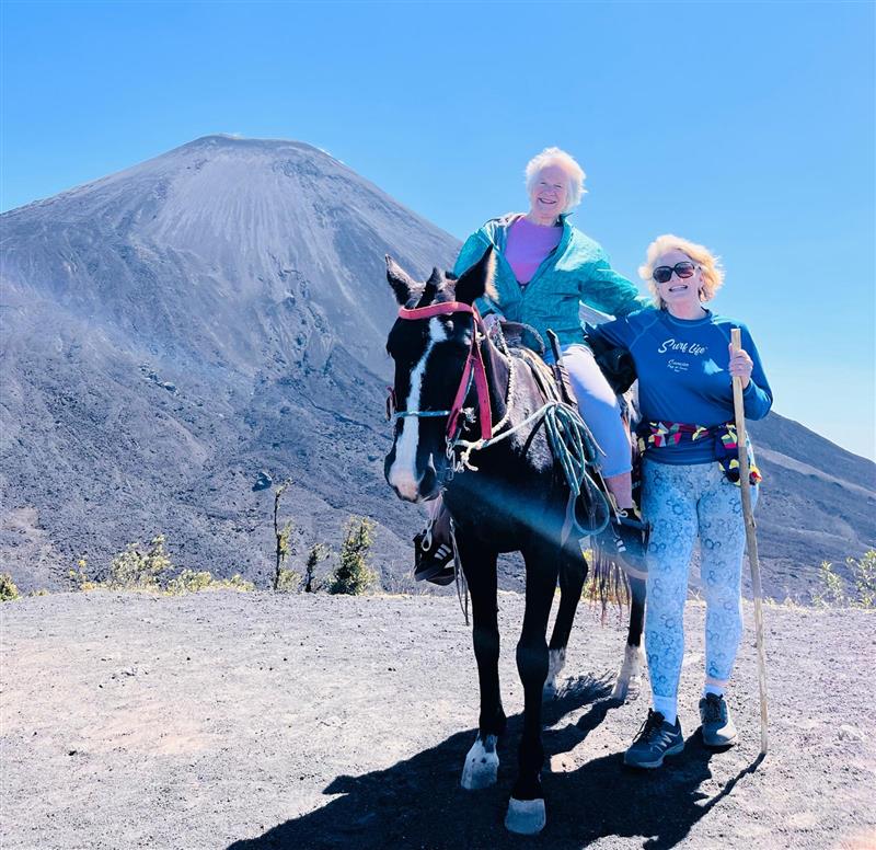 Miriam Lancaster rides a horse on top of Pacaya volcano in Guatemala in 2025. | Credit: Photo courtesy of Miriam Lancaster