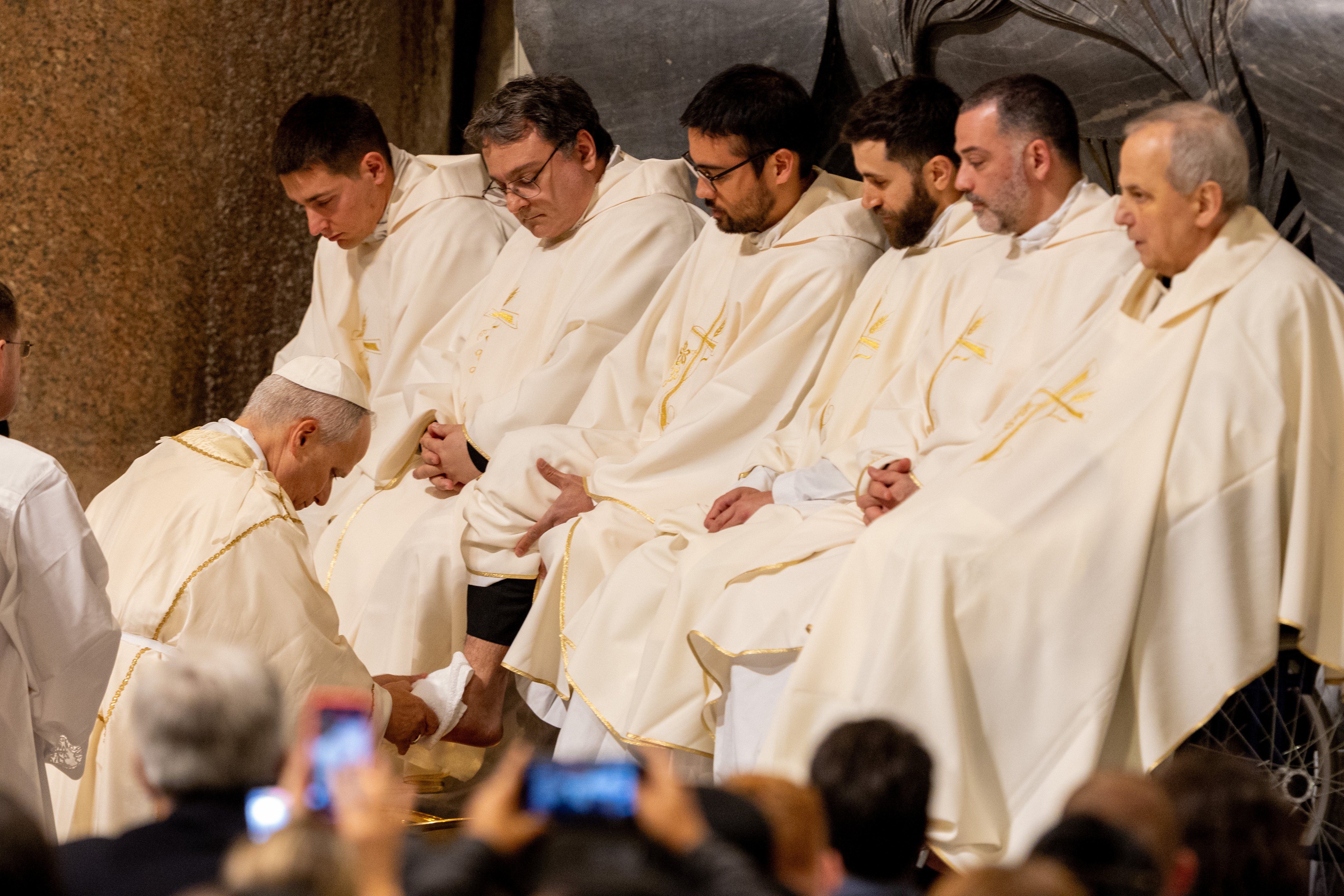 Pope Leo XIV washes the feet of priests at the Basilica of St. John Lateran during the Mass of the Lord’s Supper, Thursday, April 2, 2026. | Credit: Daniel Ibáñez/EWTN News