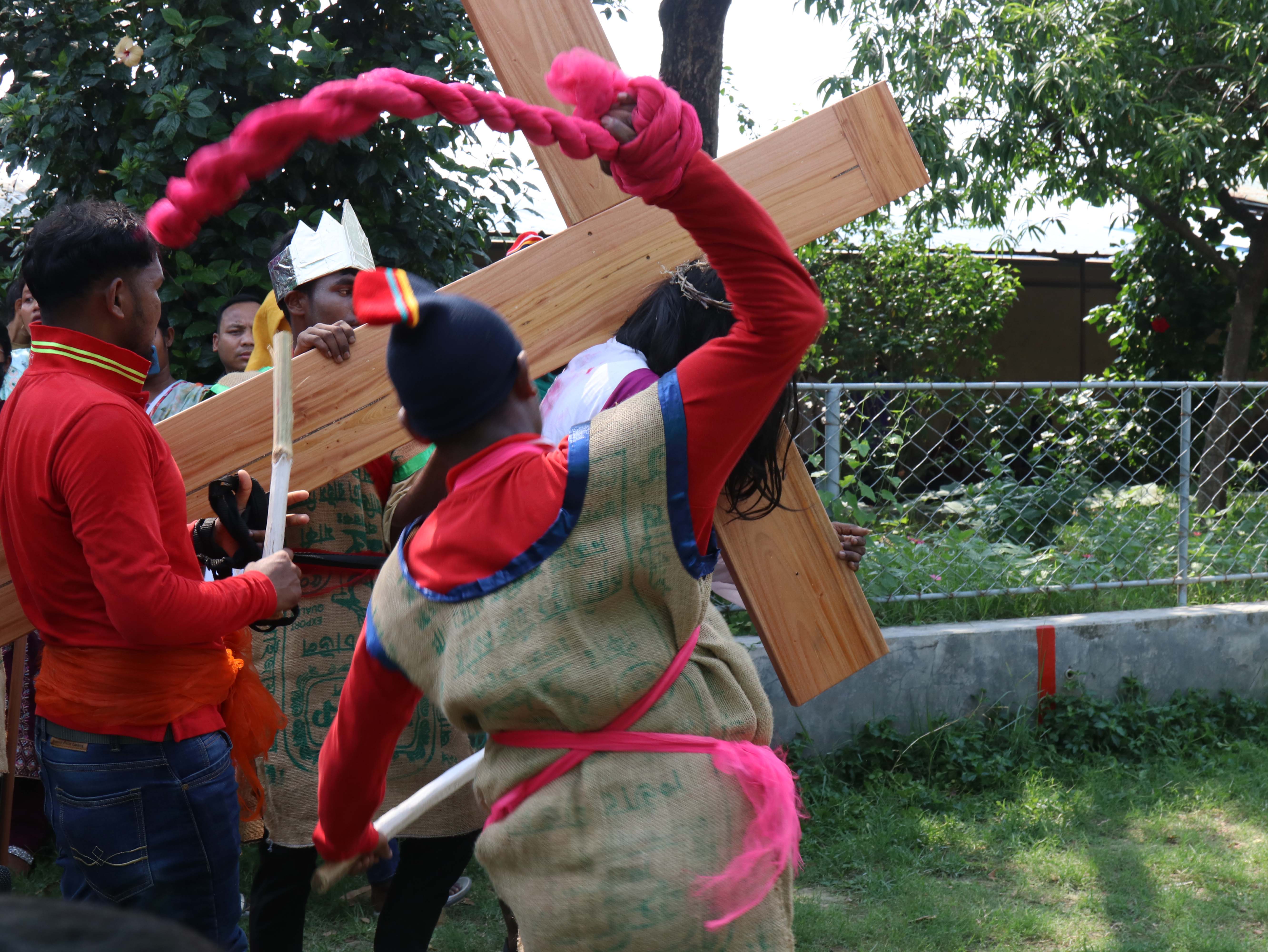Participants in costume reenact Jesus carrying the cross during a living Way of the Cross at the Jesus Worker Center in Gazipur, Bangladesh, Friday, April 3, 2026. | Credit: Stephan Uttom Rozario