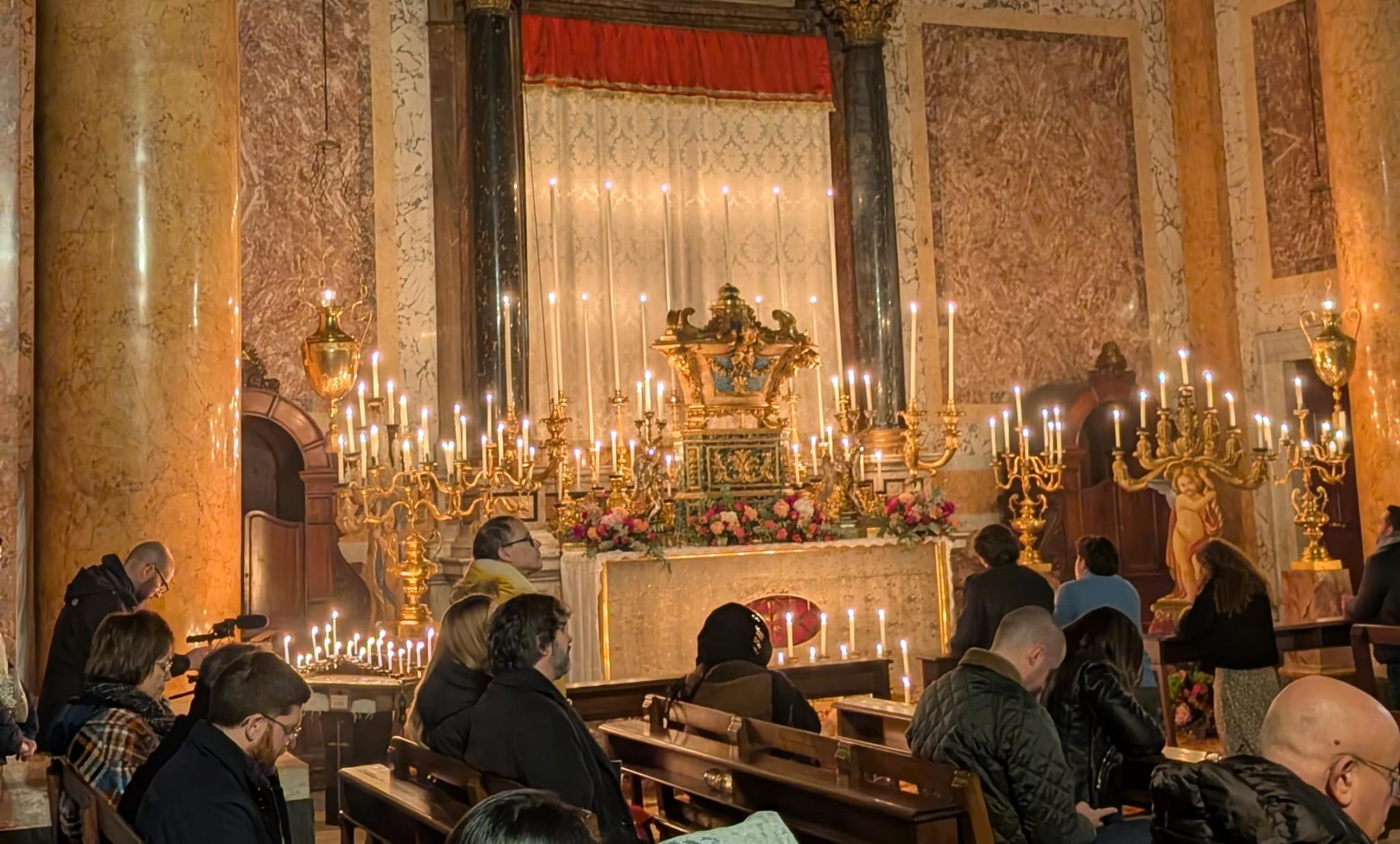 Pilgrims in adoration before the altar of repose at the Church of Santissima Trinità dei Pellegrini in Rome on April 2, 2026. Credit: Ishmael Adibuah/EWTN News.