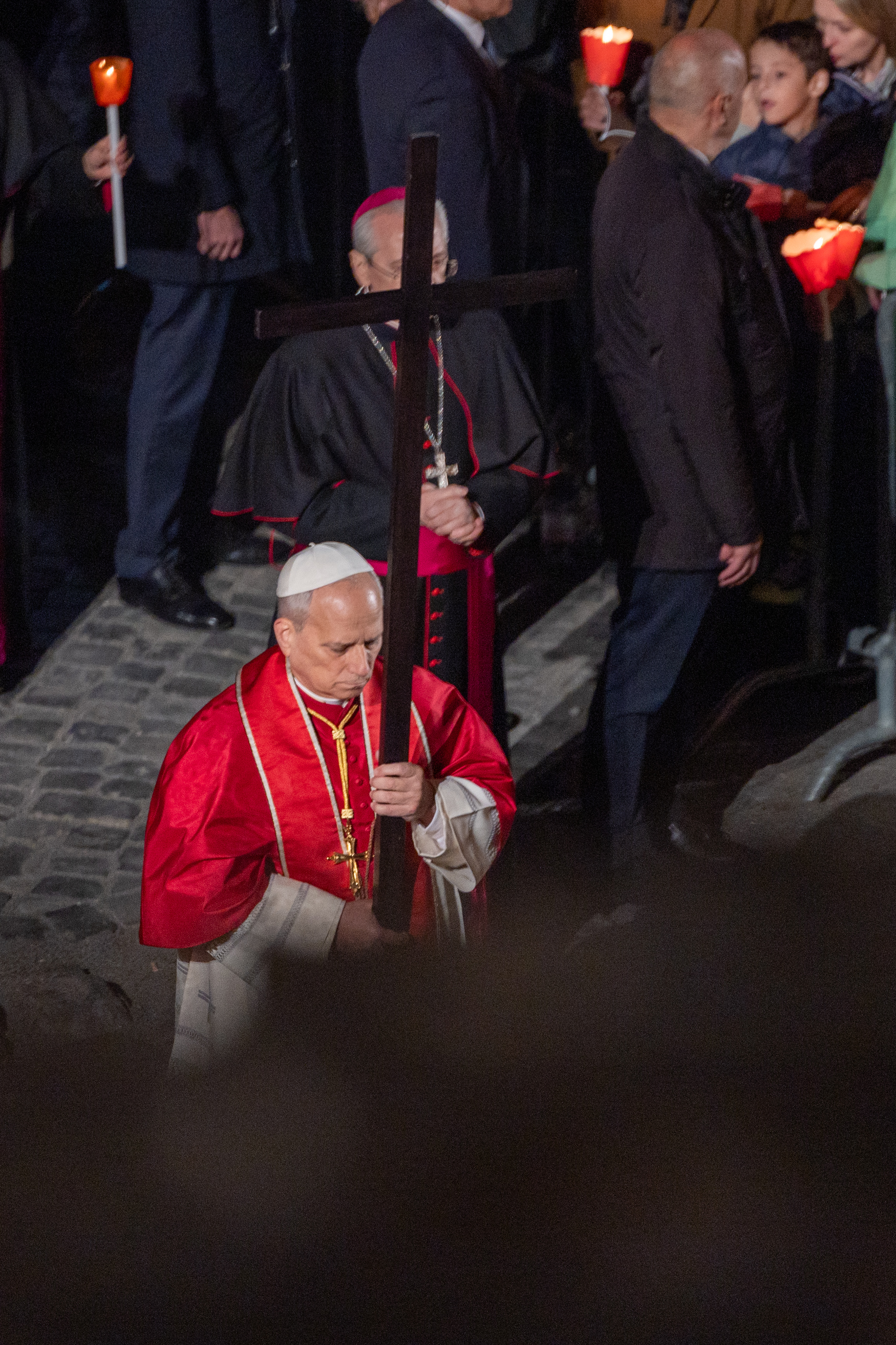 Pope Leo XIV carries the cross during the Via Crucis at the Colosseum in Rome, Friday, April 3, 2026. | Credit: Daniel Ibáñez/EWTN News