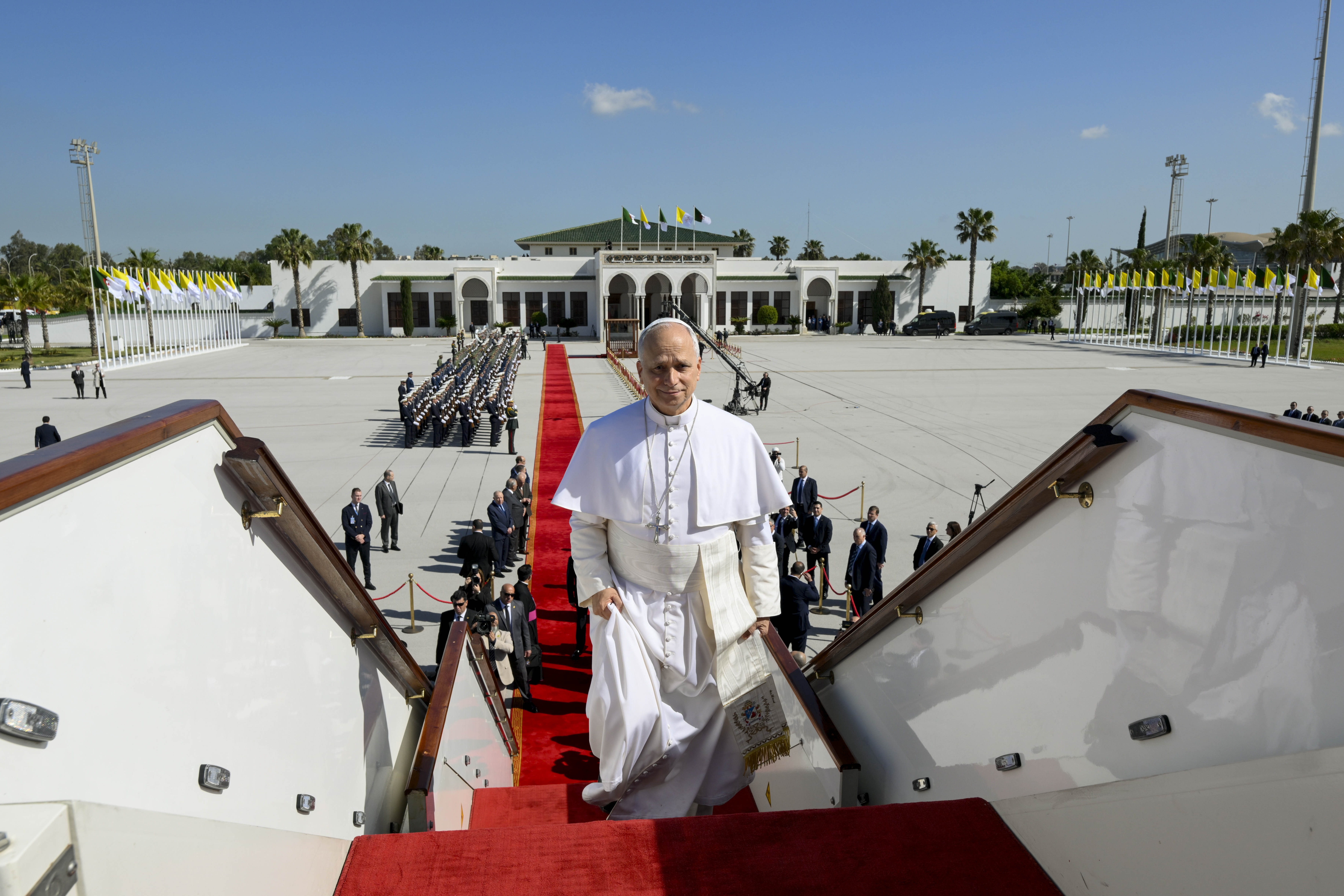 Pope Leo XIV boards the papal airplane at Houari Boumediene International Airport while departing Algeria, Wednesday, April 15, 2026. | Credit: Vatican Media
