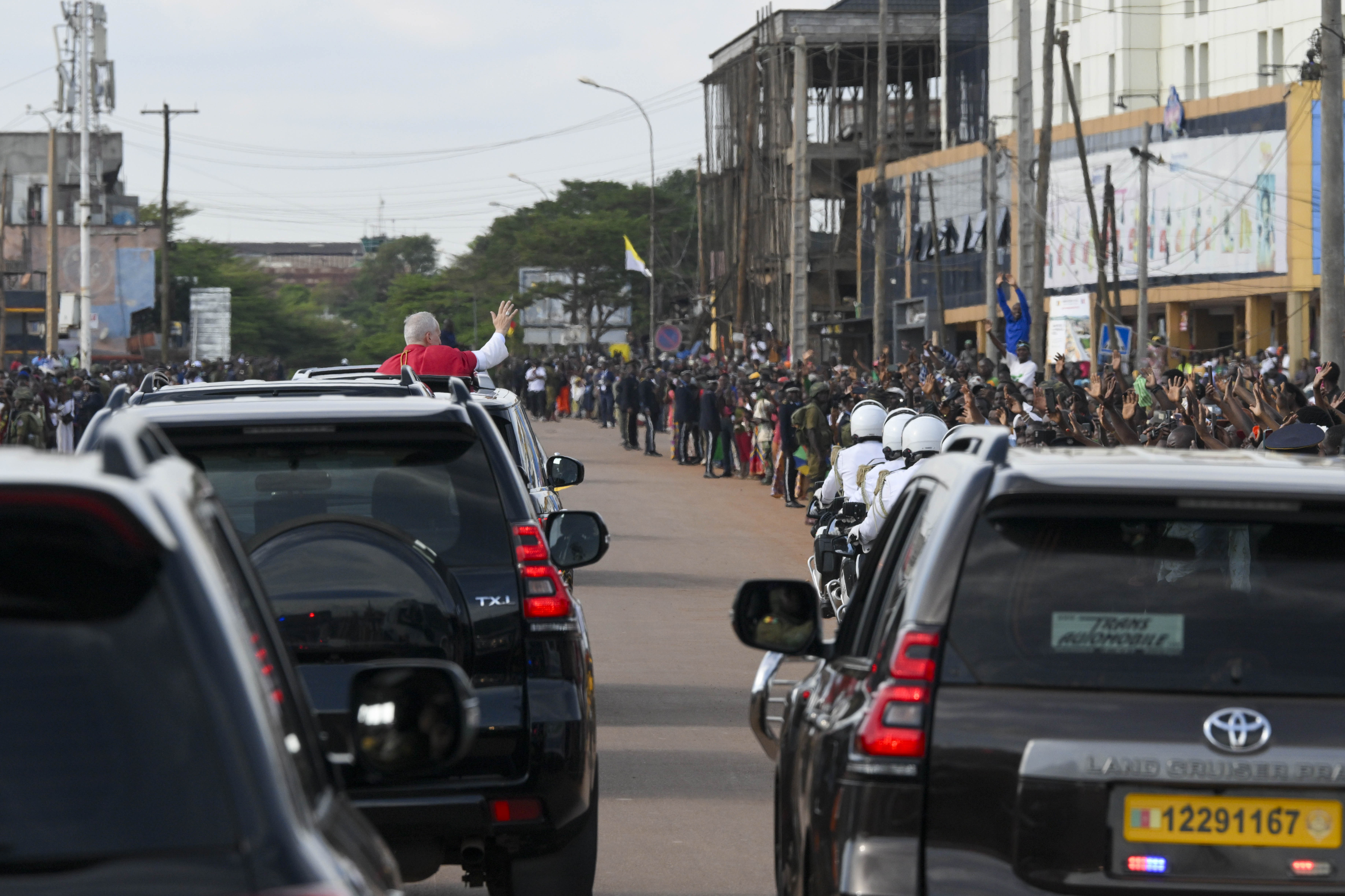 Pope Leo XIV greets crowds after landing at Yaoundé-Nsimalen International Airport in Cameroon, Wednesday, April 15, 2026. | Credit: Vatican Media