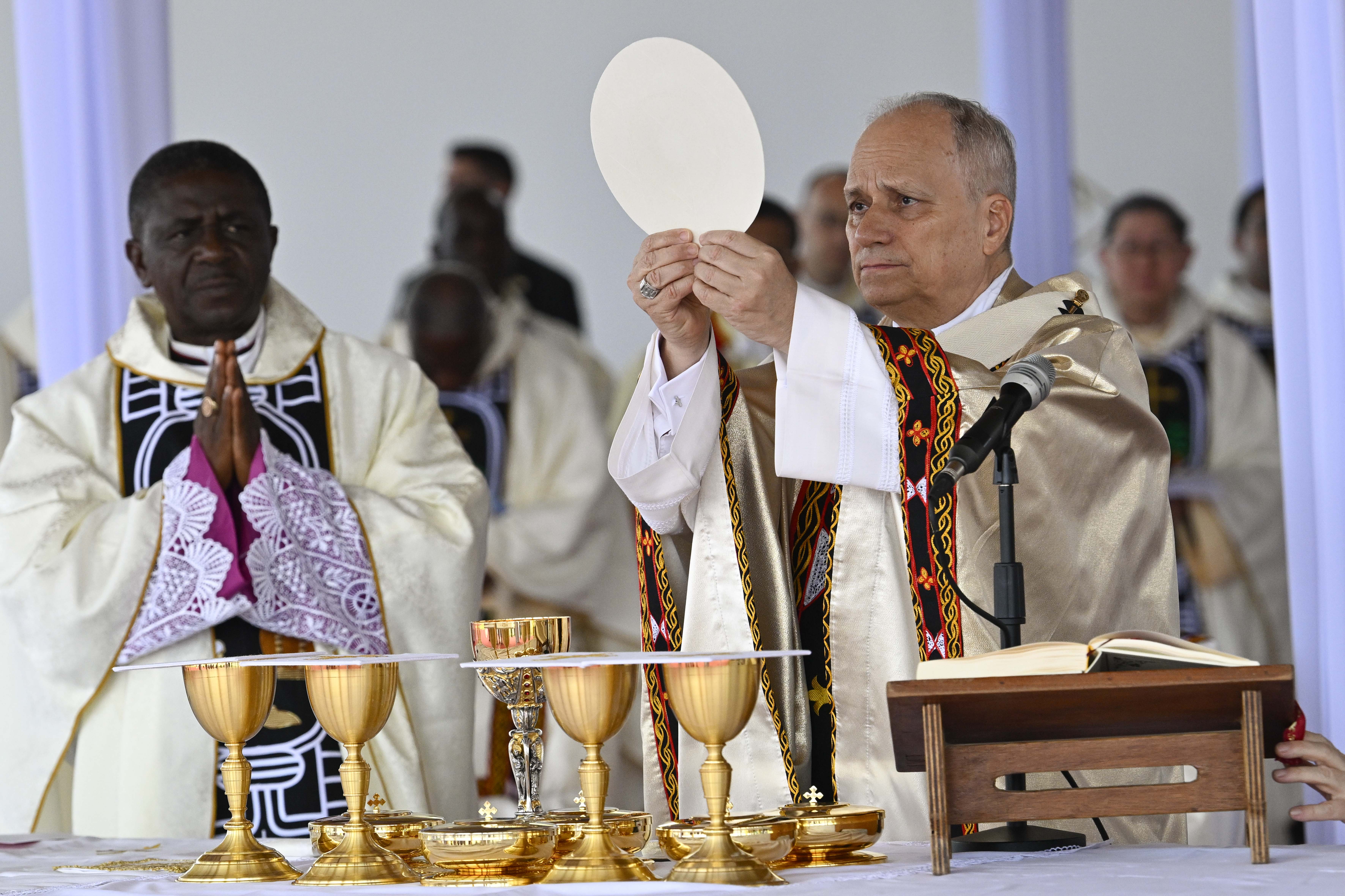Pope Leo XIV elevates the Eucharist during the papal Mass at Bamenda Airport in Cameroon on Thursday, April 16, 2026. | Credit: Vatican Media