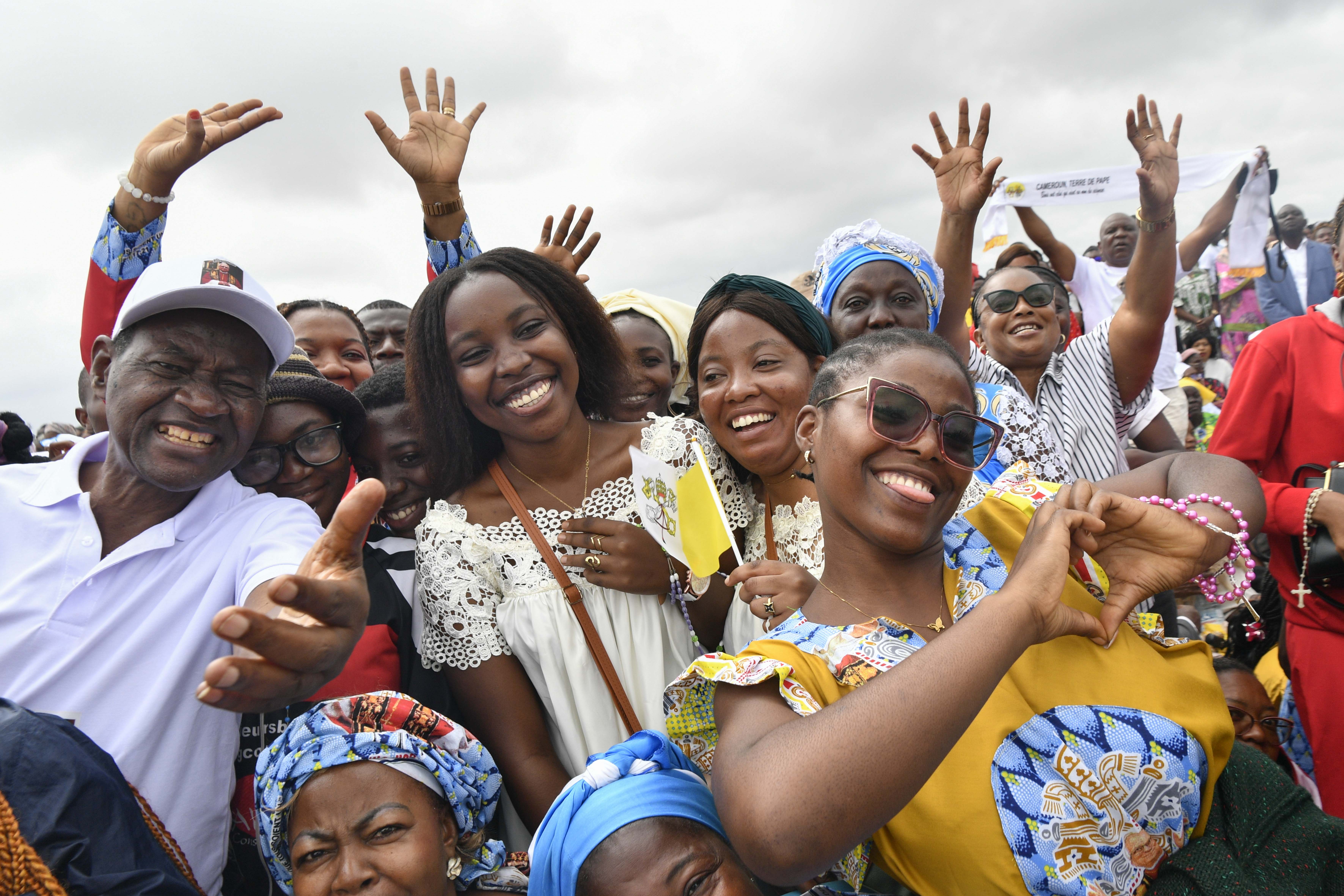 Catholics smile and wave during a papal Holy Mass at Yaoundé-Ville Airport in Cameroon, Saturday, April 18, 2026. | Credit: Vatican Media