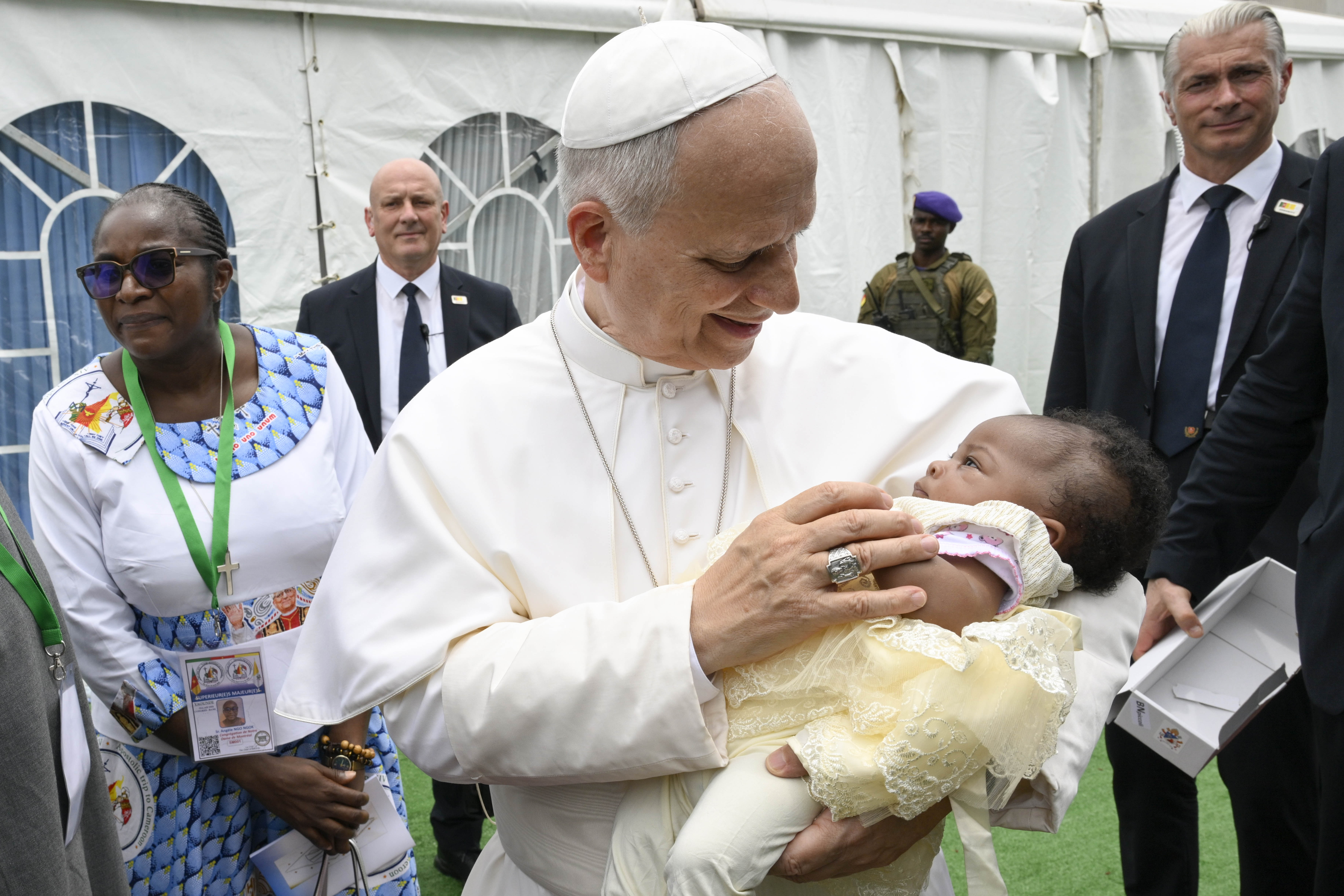 Pope Leo XIV holds a baby while at Yaoundé-Ville Airport to say Mass in Cameroon, Saturday, April 18, 2026. | Credit: Vatican Media