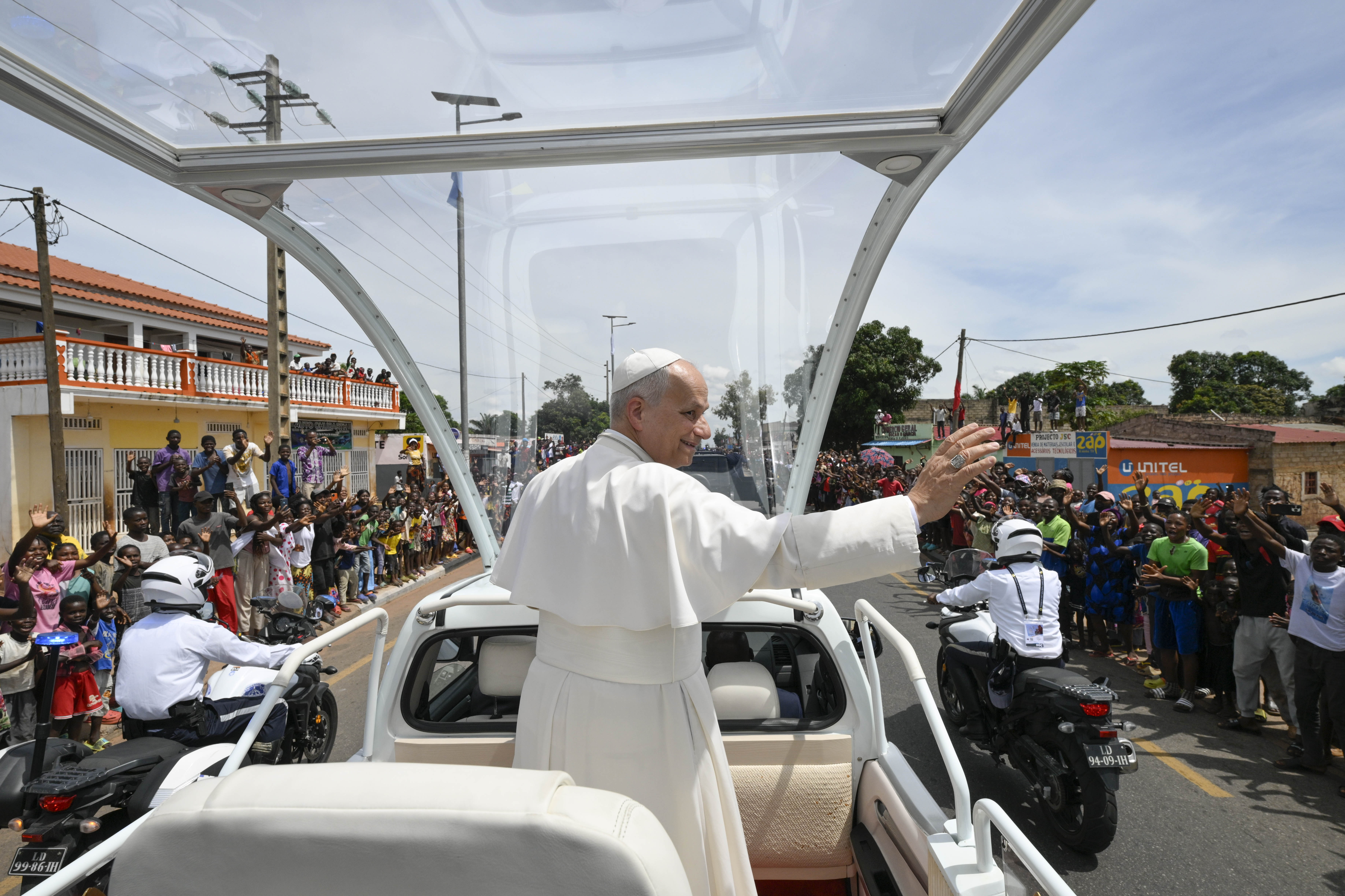 Pope Leo XIV waves to the crowds from the popemobile before celebrating Mass in Saurimo, Angola, on April 20, 2026. | Credit: Vatican Media