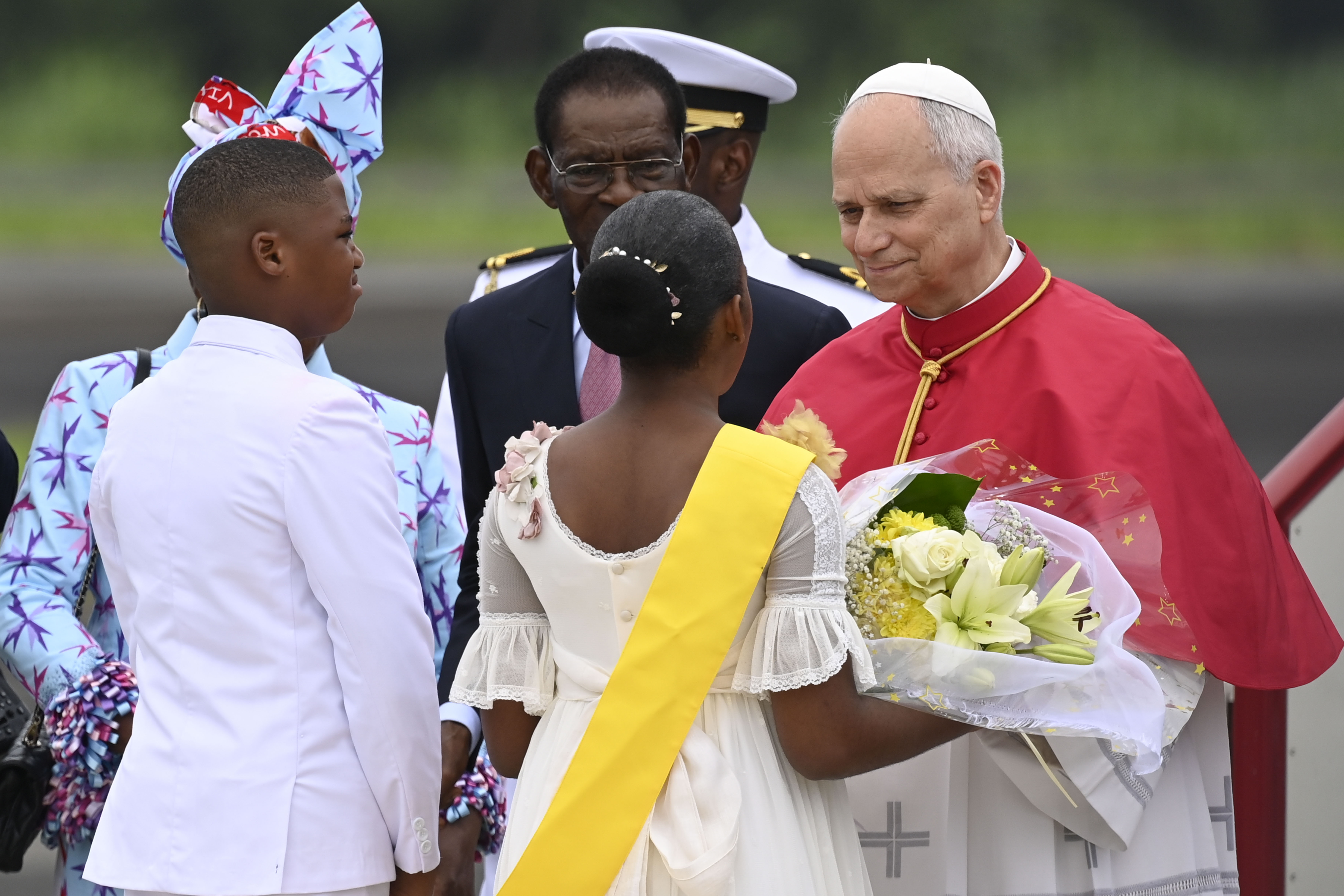 Pope Leo XIV is greeted as he arrives in Equatorial Guinea on Tuesday, April 21, 2026. | Credit: Vatican Media