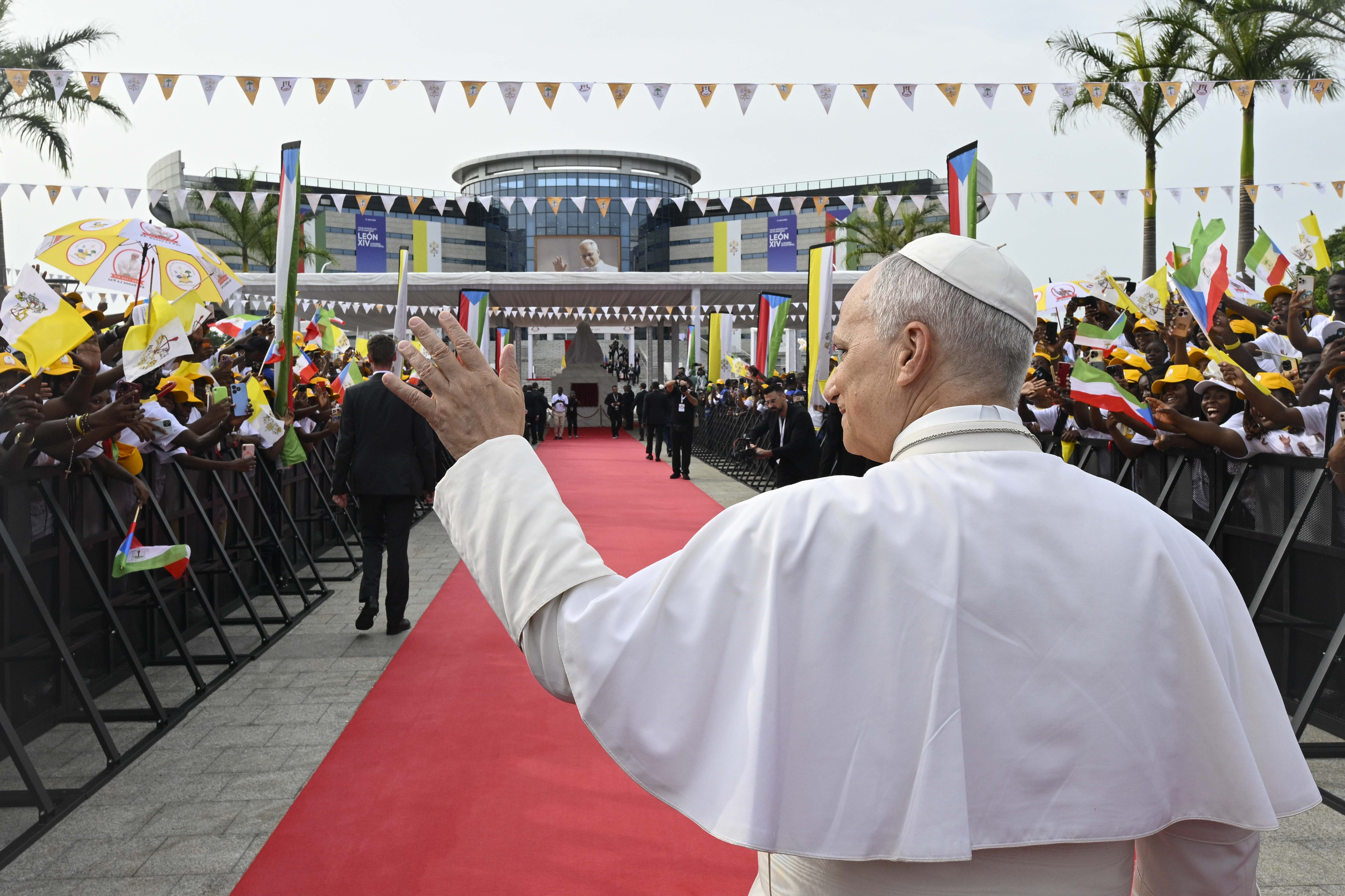 Pope Leo XIV waves to crowds during a meeting with the World of Culture at the León XIV Campus of the National University in Malabo, Equatorial Guinea, on Tuesday, April 21, 2026. | Credit: Vatican Media
