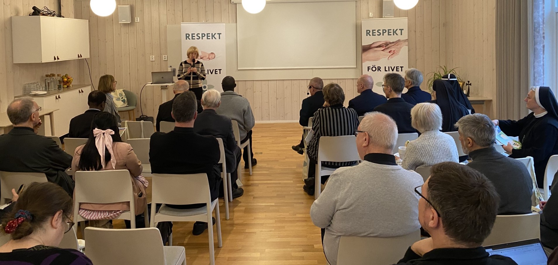 Attendees listen to a presentation at a Respekt event on the beginning of life in Sweden. | Credit: Photo courtesy of Respekt
