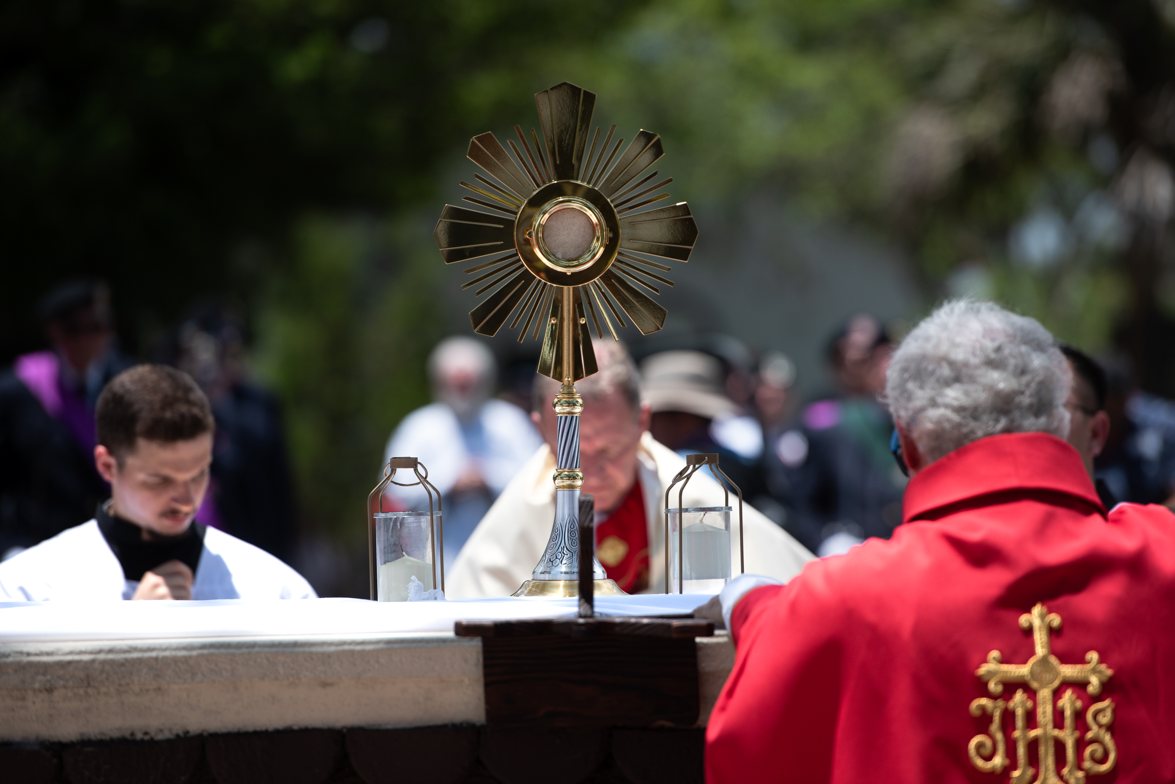 Bishop Erik Pohlmeier kneels before the monstrance during exposition of the Blessed Sacrament on the opening day of the National Eucharistic Pilgrimage on Pentecost Sunday, May 24, 2026, in St. Augustine, Florida. | Credit: Jeffrey Bruno