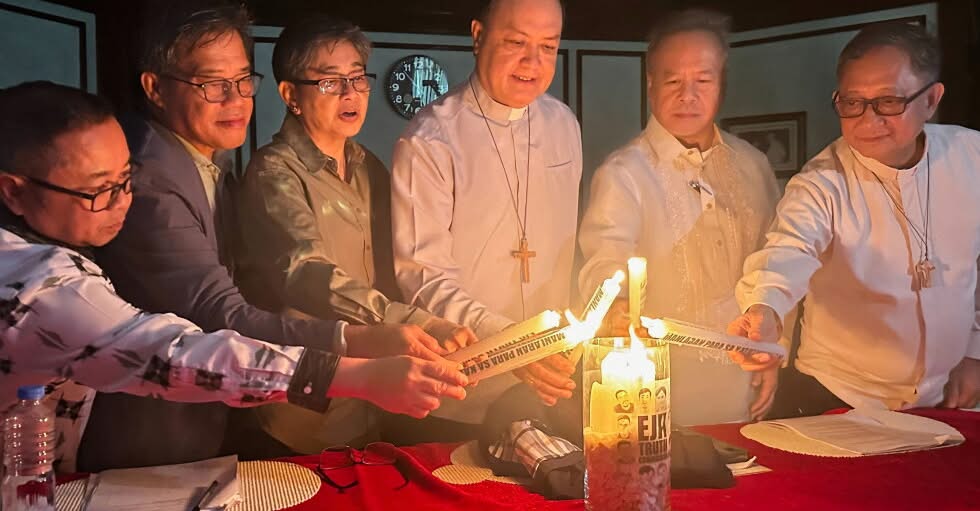 Members of the Philippine Truth and Reconciliation Commission light candles in tribute to victims of alleged extrajudicial killings in the Philippines before addressing a press conference during the body’s launch in Manila on May 27, 2026. | Credit: Photo courtesy of the Philippine Truth and Reconciliation Commission