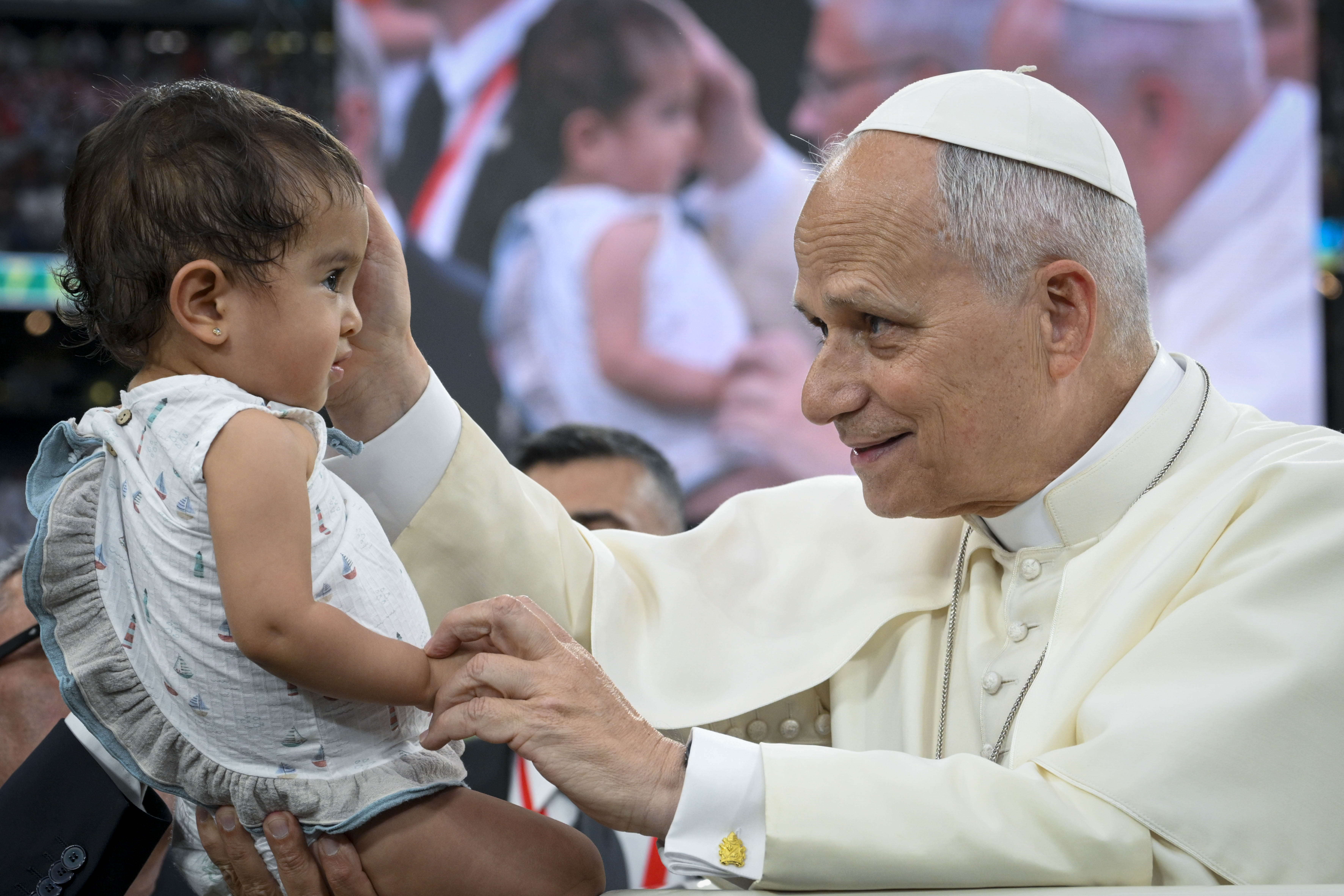 Pope Leo blessing a child at the Santiago Bernabéu stadium in Madrid, June 8, 2026. | Credit: Daniel Ibañez/EWTN News