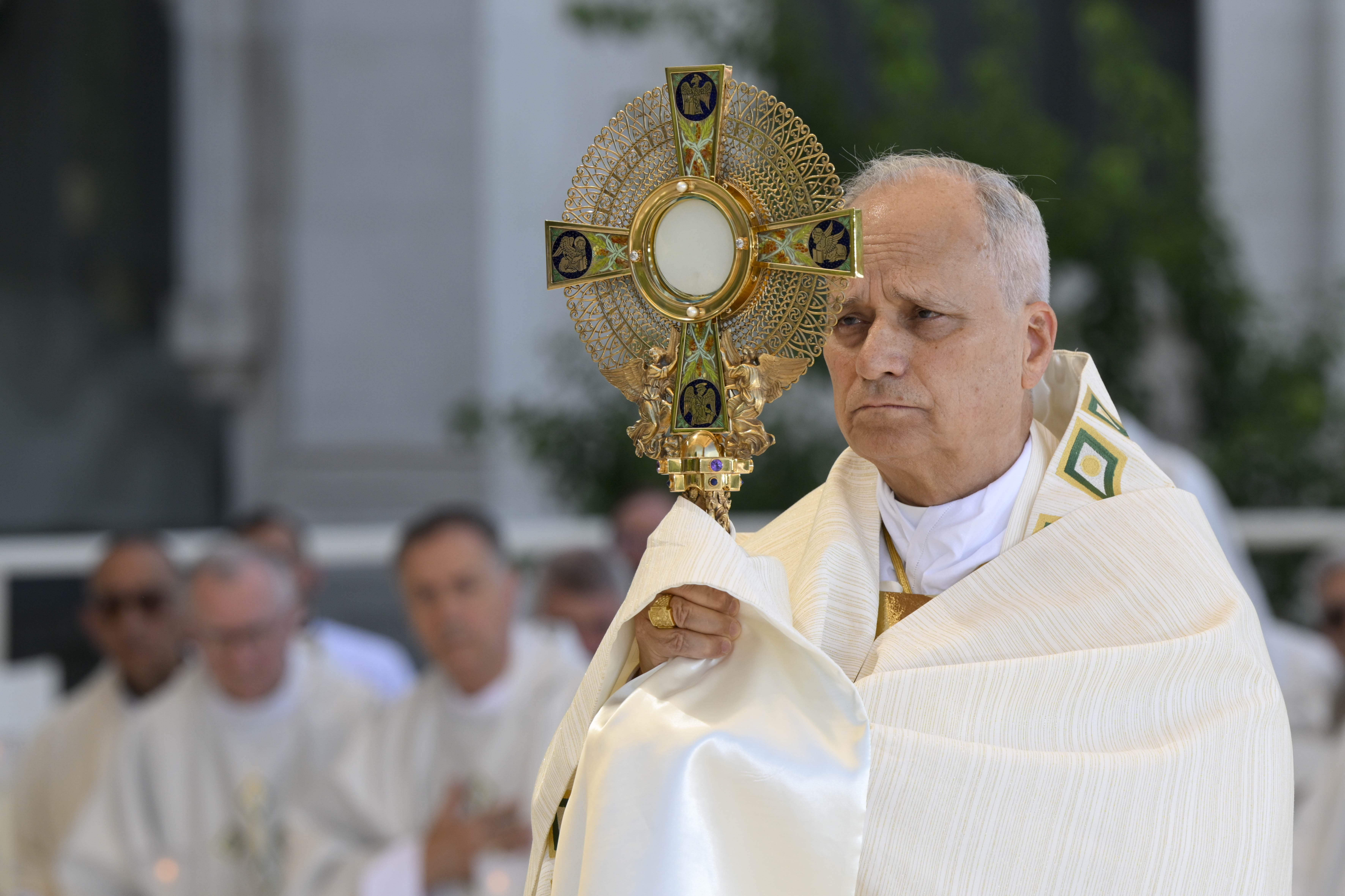 Pope Leo XIV elevates the Eucharist during Mass at the Plaza de Cibeles in Madrid, June 7, 2026. The Holy Father said Mass in the historic plaza on the feast of Corpus Christi. | Credit: Vatican Media