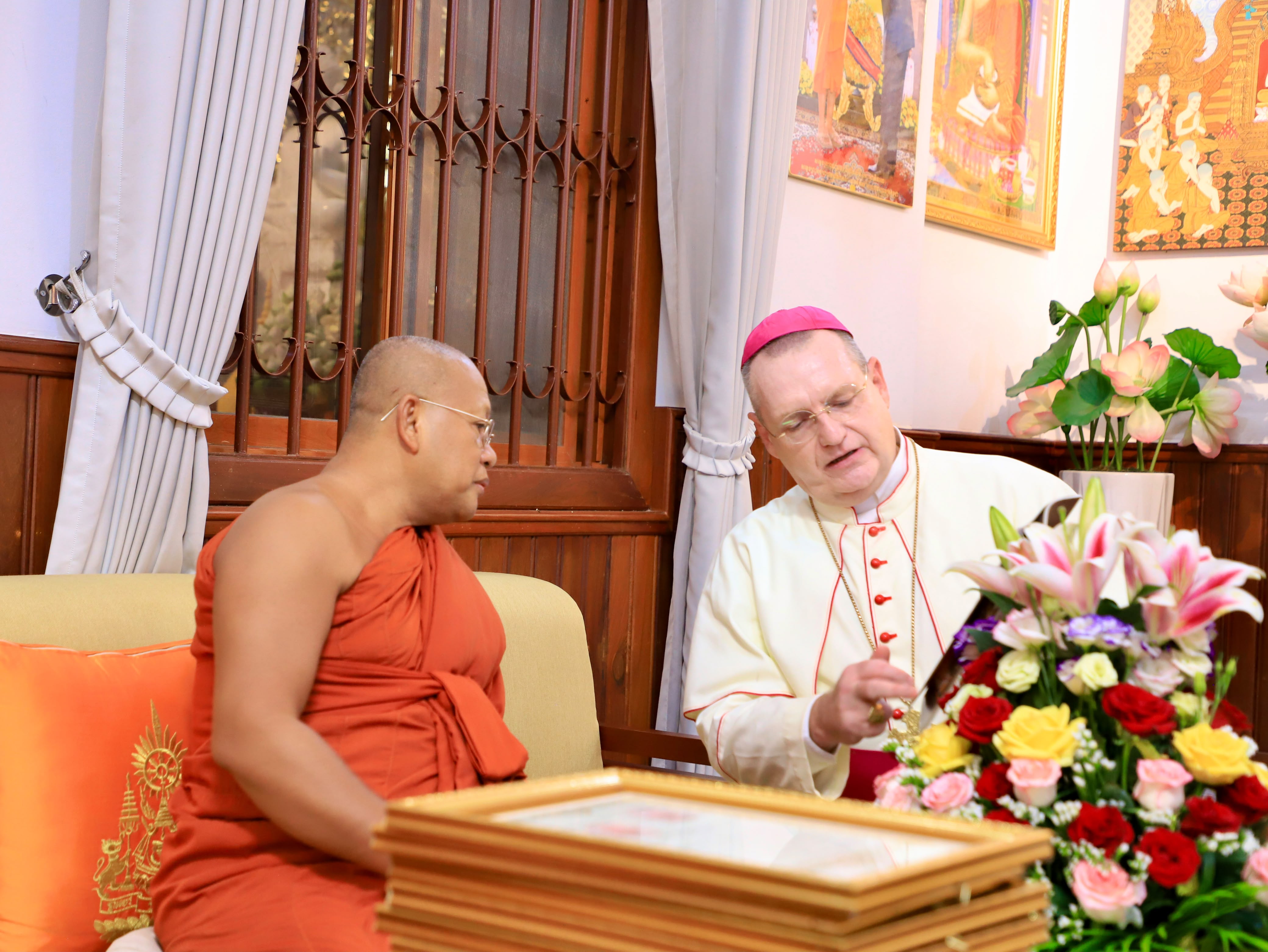 Bishop Olivier Schmitthaeusler meets with Venerable Khim Sorn, third deputy supreme patriarch of Cambodiaʼs Mohanikaya Buddhist order, during a ceremony at Wat Botum Vatey in Phnom Penh on June 13, 2026. | Credit: Ly Sovanna/Catholic National Office for Social Communications in Cambodia