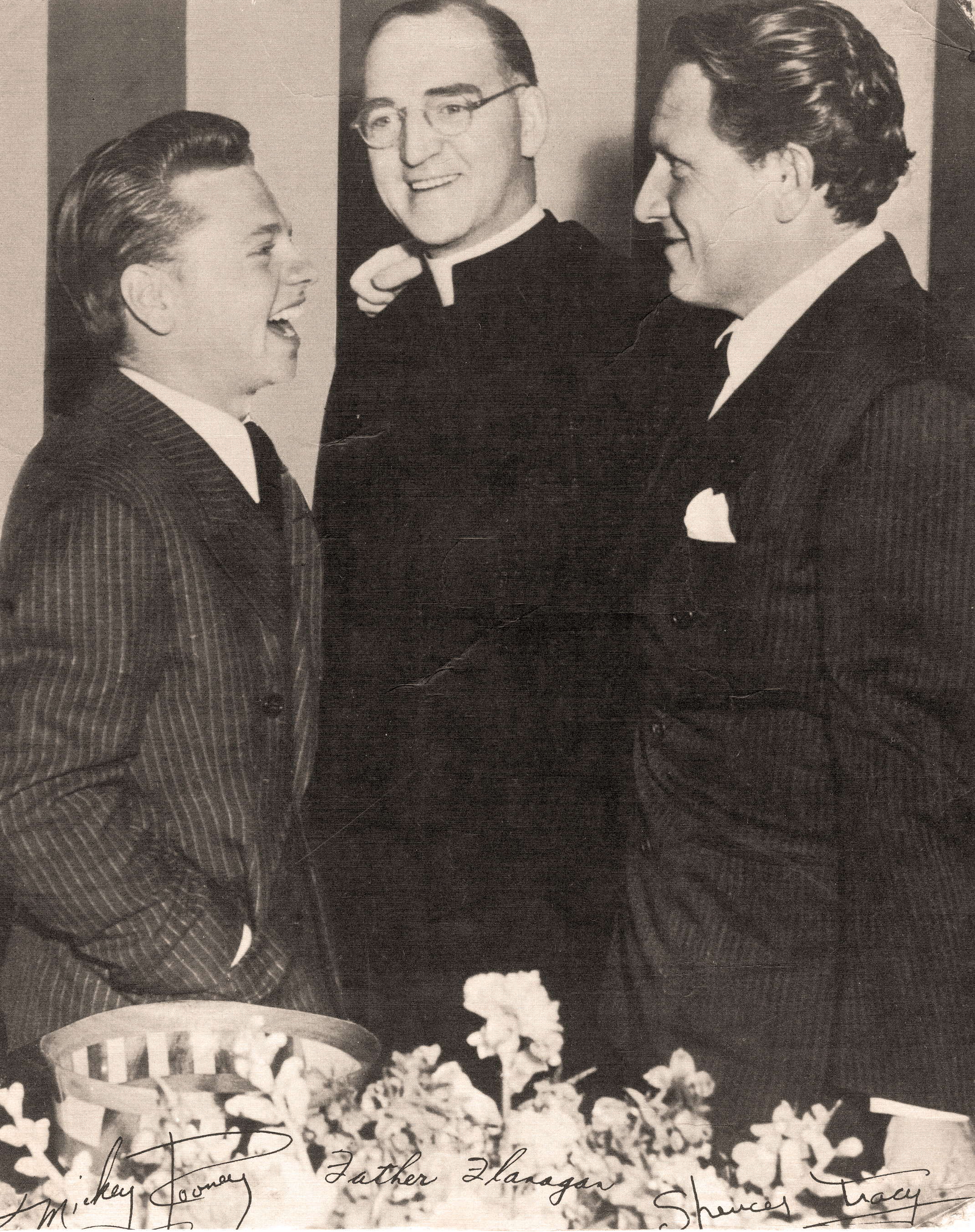 Father Edward J. Flanagan with Mickey Rooney and Spencer Tracy who were actors in the 1938 movie “Boys Town.” Photo courtesy of Boys Town. 