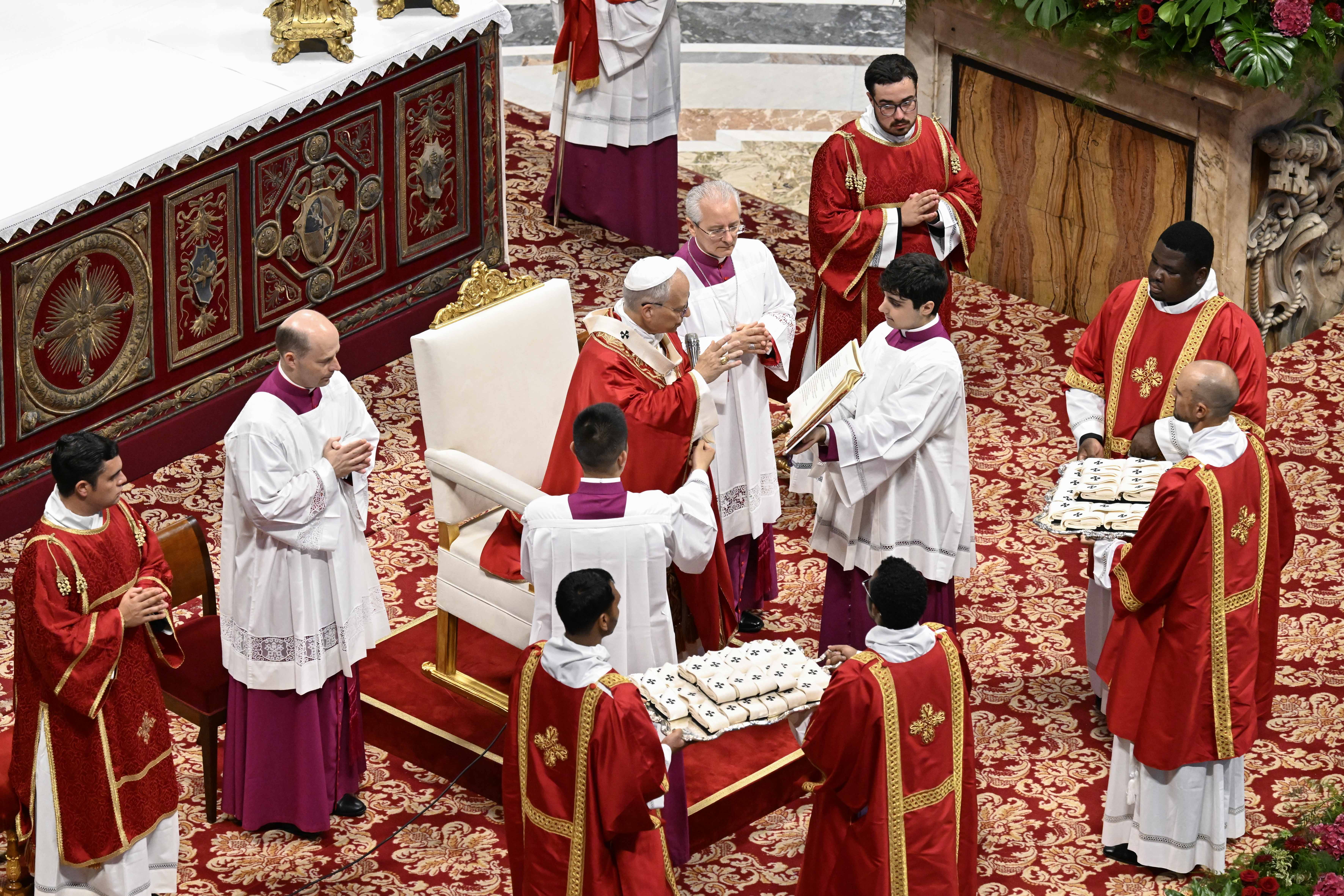 Pope Leo XIV prepares to bless the pallia before bestowing them on new metropolitan archbishops in a ceremony in St. Peter's Basilica on June 29, 2025. | Credit: Vatican Media