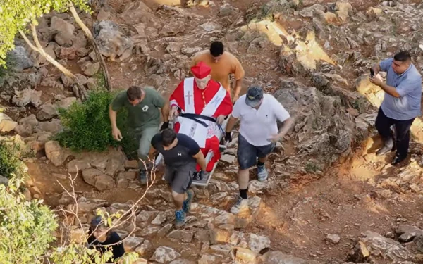 Members of the Cenacolo Community carry Cardinal Simoni in Medjugorje. | Credit: Courtesy of  Maria Vision Medjugorje