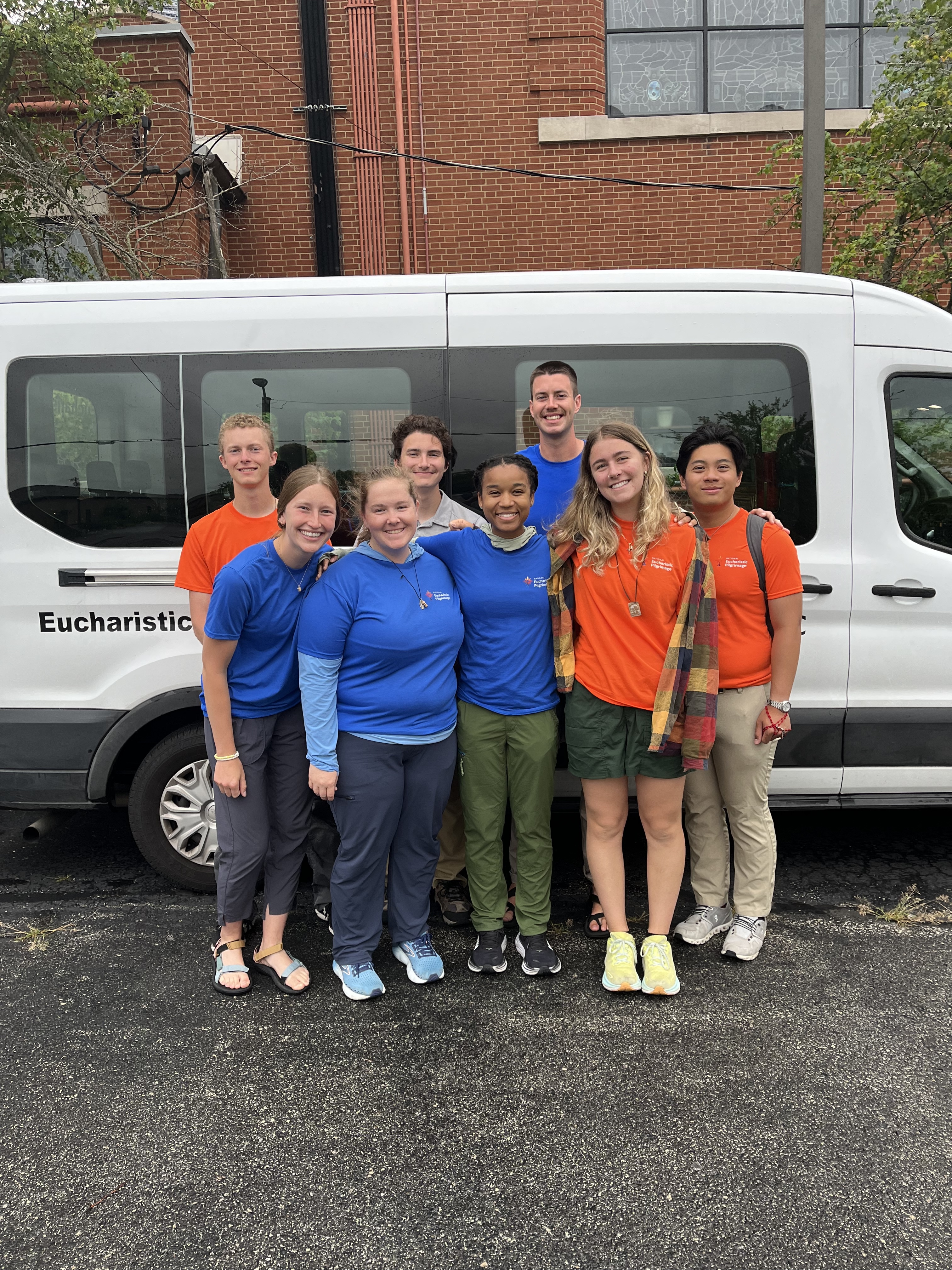MacKenzie Warrens, middle, stands with the group of Perpetual Pilgrims&nbsp;after completing the Diego Route in July 2024.| Credit: Photo courtesy of National Eucharistic Congress, Inc.