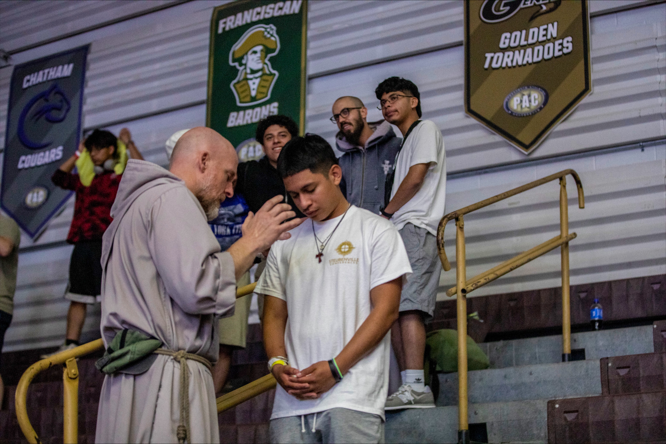 A young man is prayed over by a Franciscan friar at a Steubenville Youth Conference. | Credit: Franciscan University of Steubenville