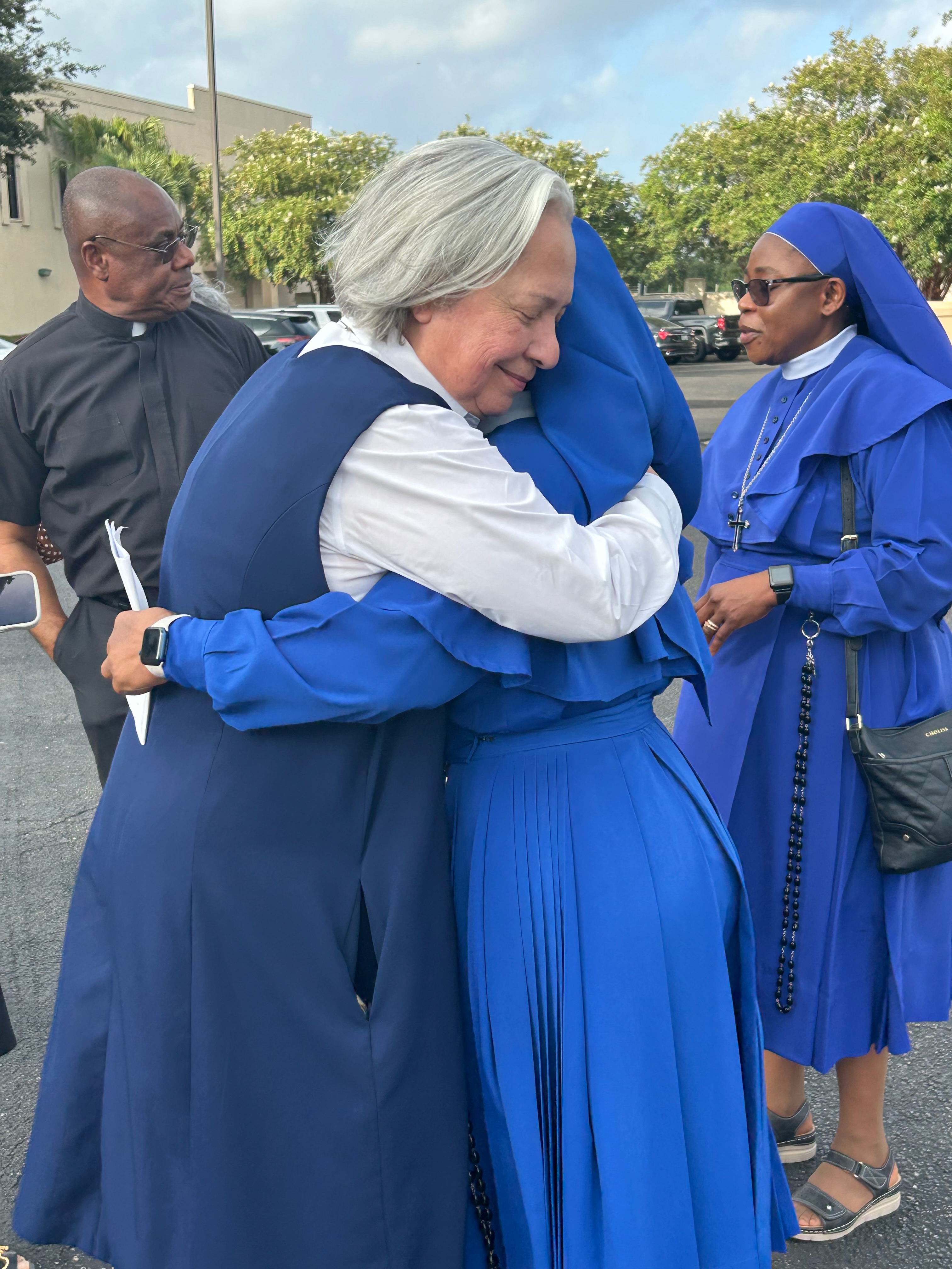 Sister Norma Pimentel hugs Sister Leticia Ugboaja outside the ICE field office in Harlingen, Texas, before Ugboaja’s July 28, 2026, immigration check-in. | Credit: Amira Abuzeid/EWTN News