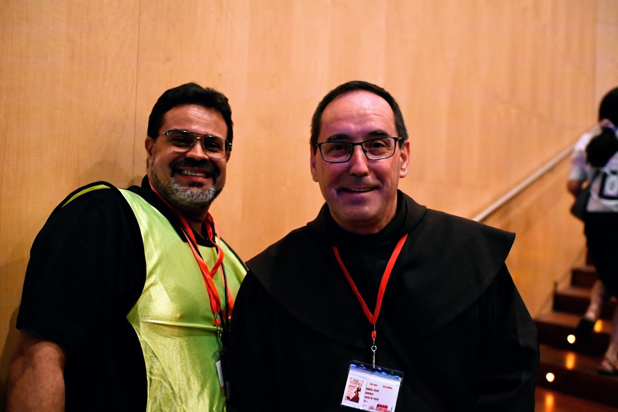 Father Miguel Marquez Calle, OCD, superior general of the Order of Discalced Carmelites, right, with a volunteer at the first world meeting of the Order of Discalced Carmelites (OCD) July 23–26, 2026. | Credit: Photo courtesy of OCDS World Encounter/Gonzalo Gonzalez de Vega Pomar