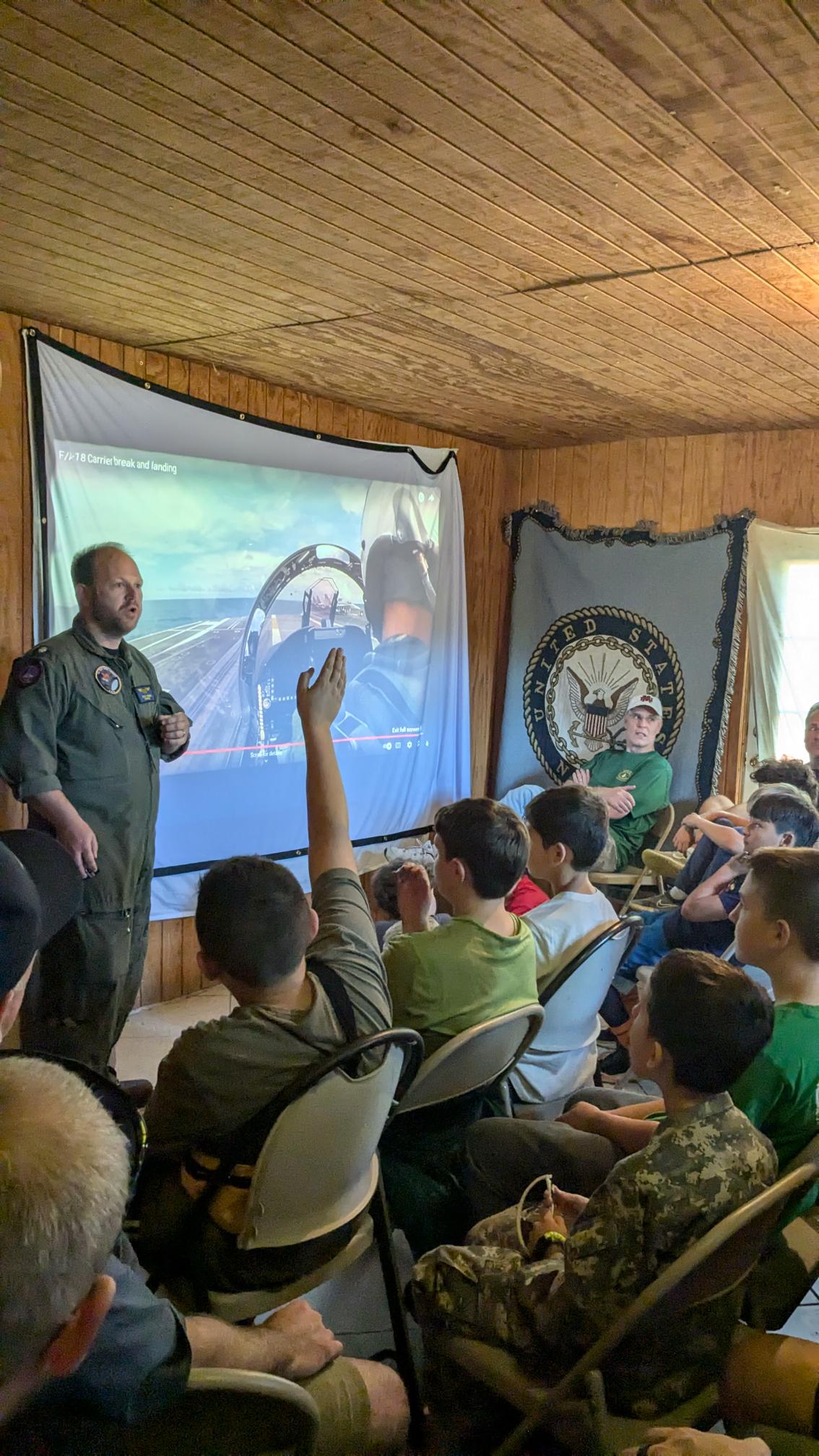 Retired Top Gun pilot Lt. Adam Farber speaks to participants at the 2024 Top Gun Father and Son weekend event held at Camp Castleton in Virginia. | Credit: Photo courtesy of Father Vito Crincoli