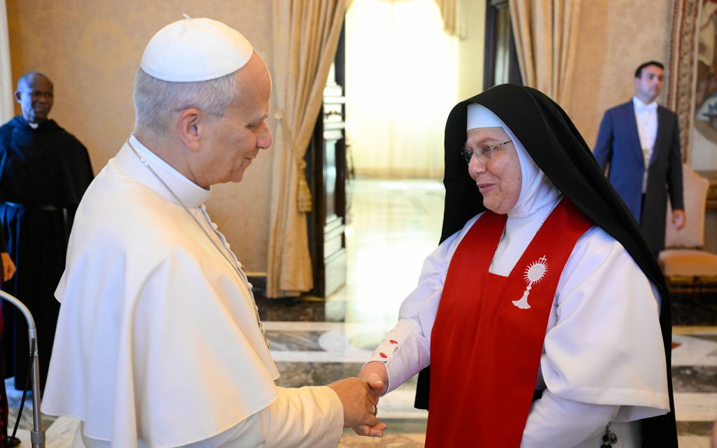 Pope Leo XIV greets one of the Perpetual Adorers of the Blessed Sacrament in the Consistory Hall at the Vatican on Saturday, September 5, 2026. Credit: Vatican Media.
