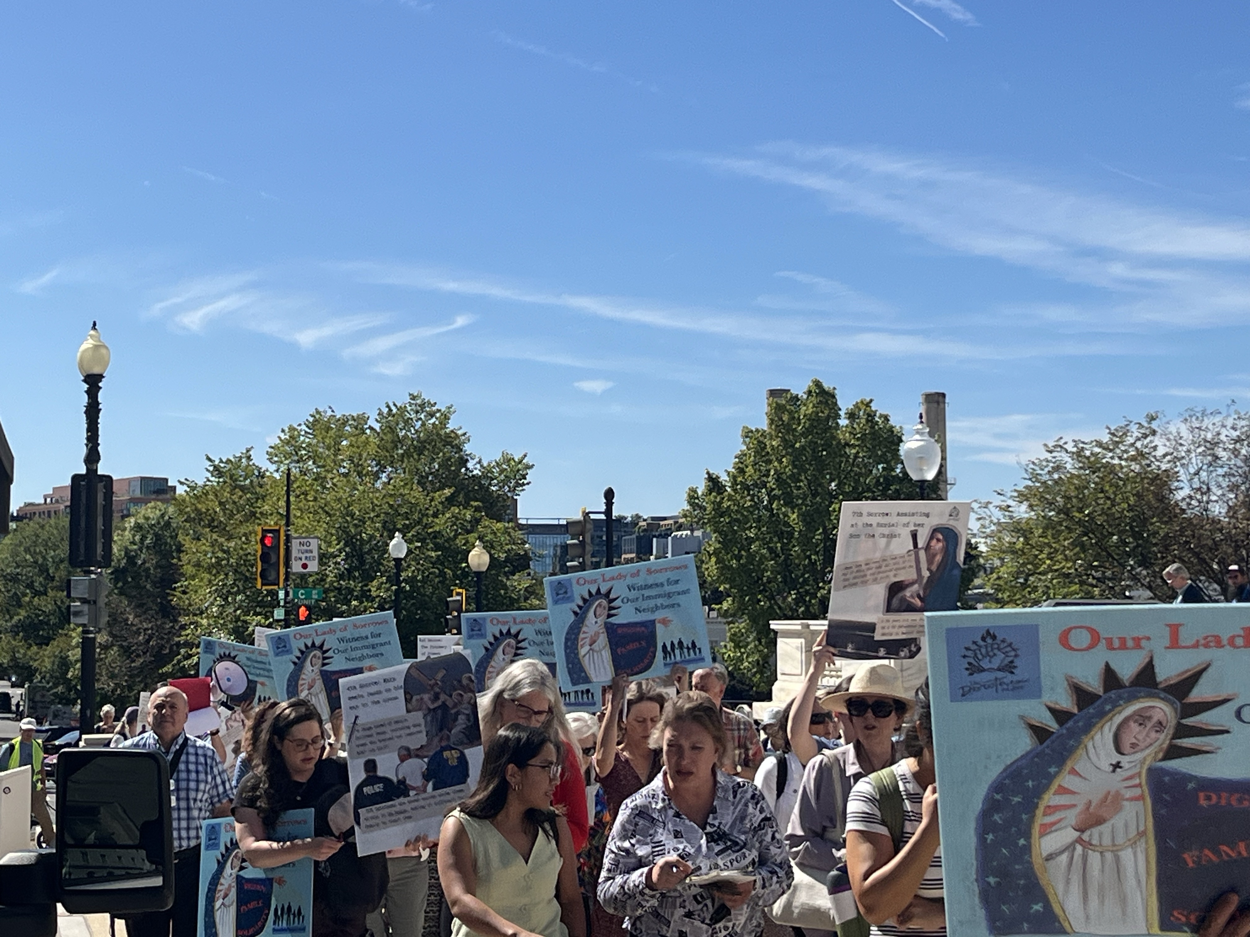 Catholics gather for a procession in Washington, D.C., to show solidarity with migrants on Sept. 15, 2026, organized by the Dorothea Project. | Credit: Tyler Arnold/ EWTN News