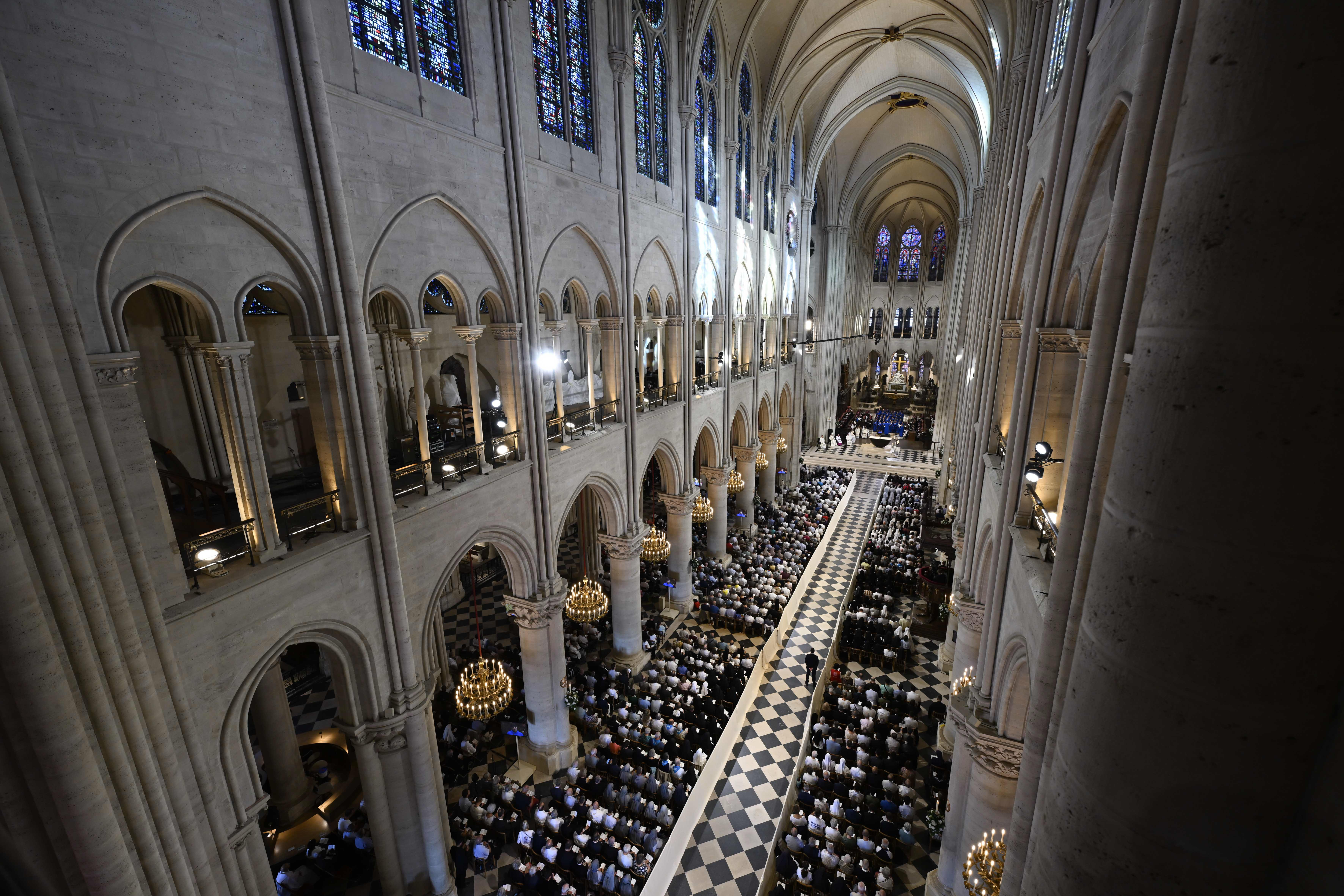 Worshipers pray at Notre-Dame Cathedral where Pope Leo XIV visited Sept. 25, 2026 to celebrate Vespers in the first papal visit since the 2019 blaze.| Credit: Vatican Media