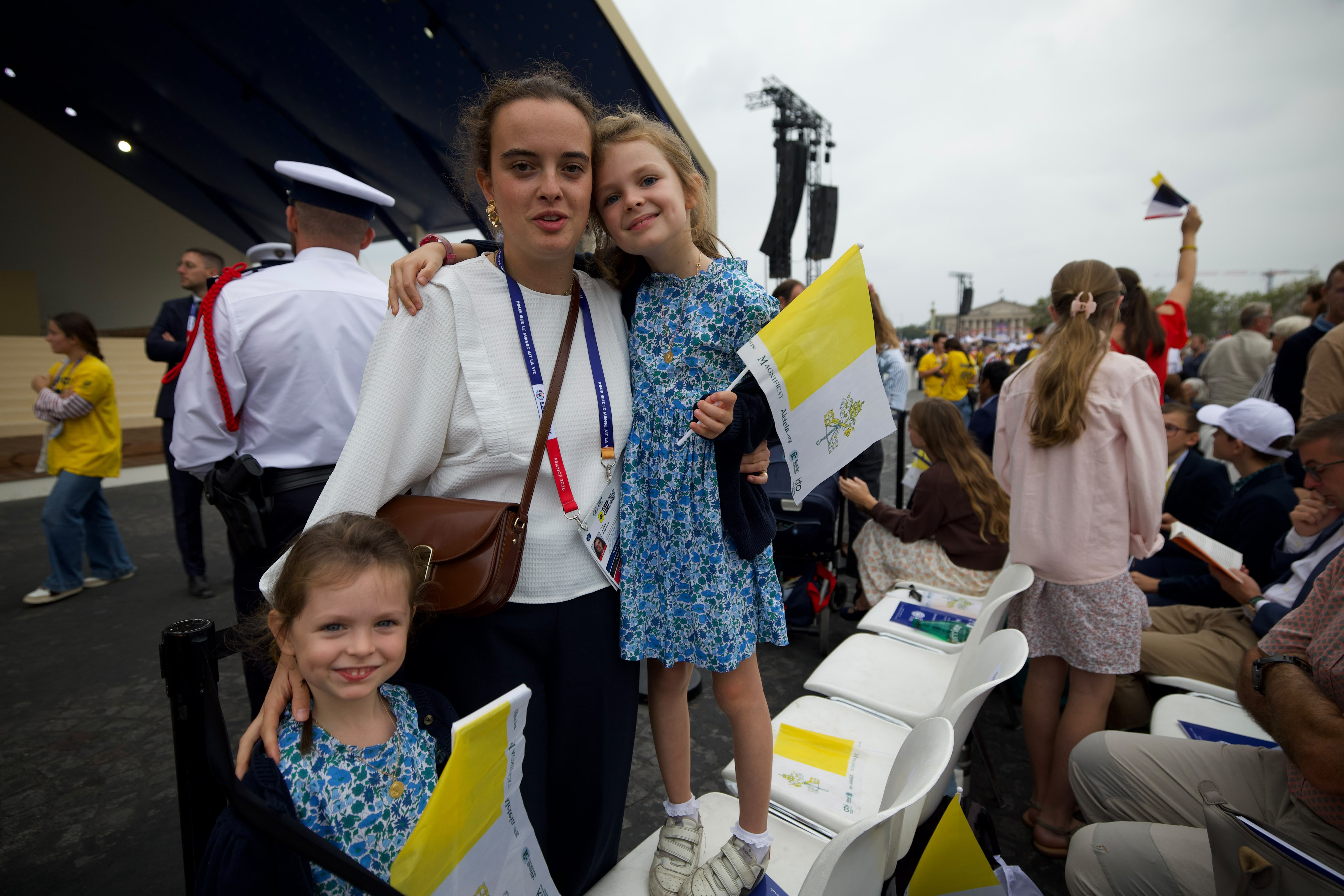 A young family waits for Pope Leo XIV’s open-air Mass to begin on Sept. 26, 2026, in Paris. | Credit: Daniel Ibáñez/EWTN News