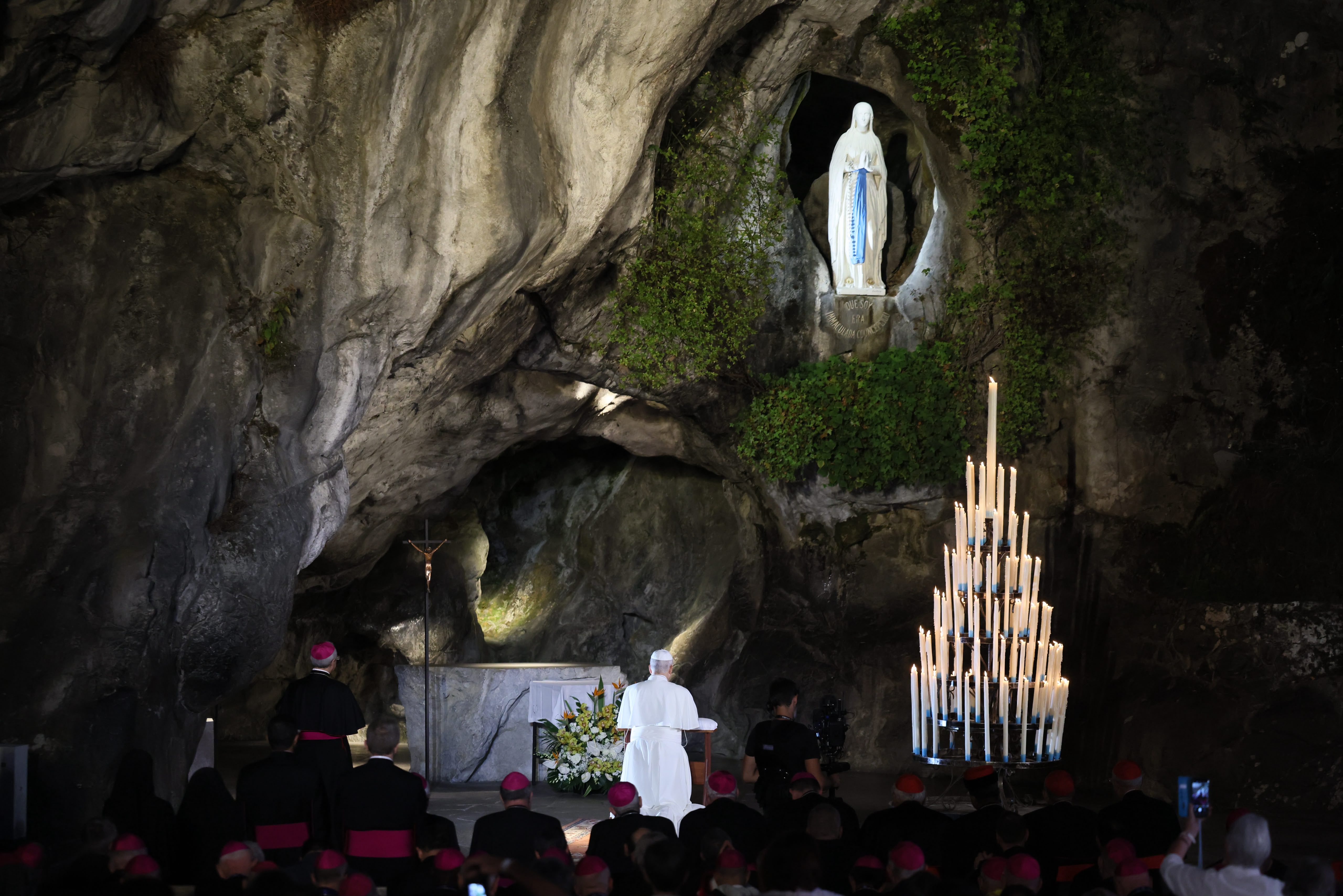 Pope Leo XIV prays at the grotto in the Shrine of Our Lady of Lourdes on Sept. 26, 2026, in France. | Credit: Daniel Ibáñez/EWTN News