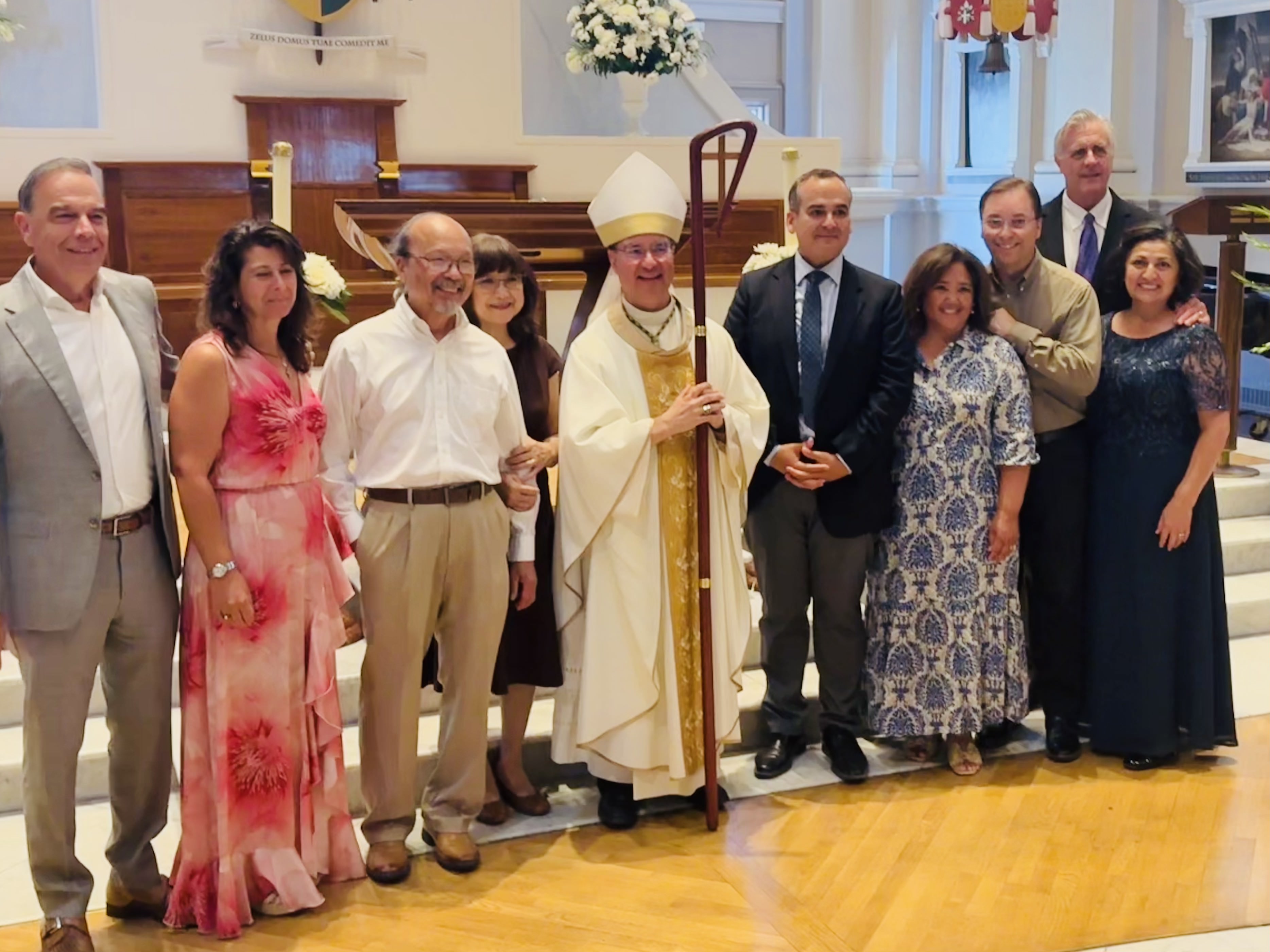 Members of the Radiate Love Task Force pose with Jose Soto, center-left, and Bishop Oscar Cantú, center, with task force mentors Richard and Veronica Wildanger pictured on the far right. | Credit: Oliver Tapia/Diocese of San Jose