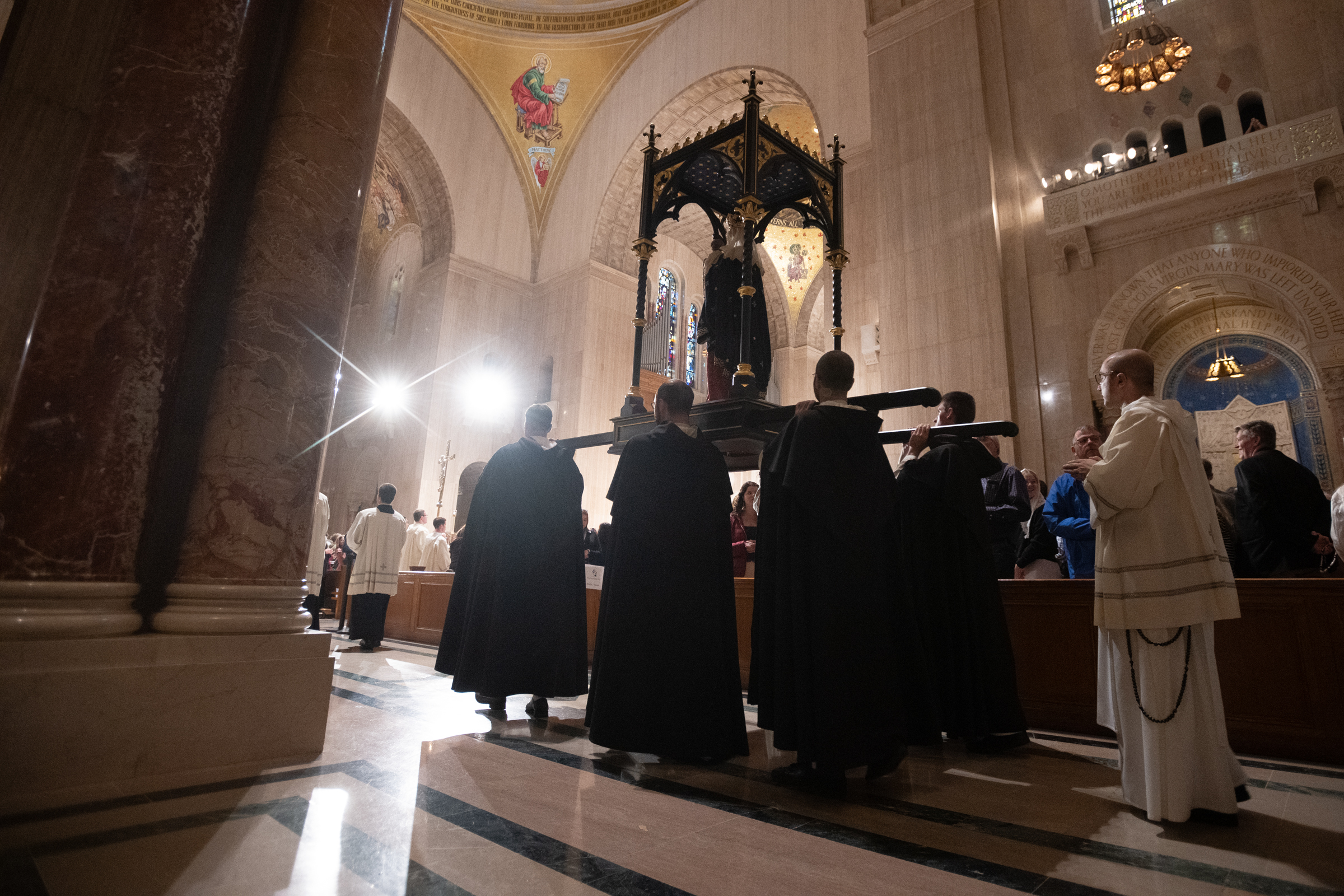 Dominican friars carry a statue of Mary holding the infant Jesus through the basilica during the rosary procession at the Basilica of the National Shrine of the Immaculate Conception in Washington, D.C., for the Dominican Rosary Pilgrimage on Saturday, Sept. 26, 2026. | Credit: Jeffrey Bruno