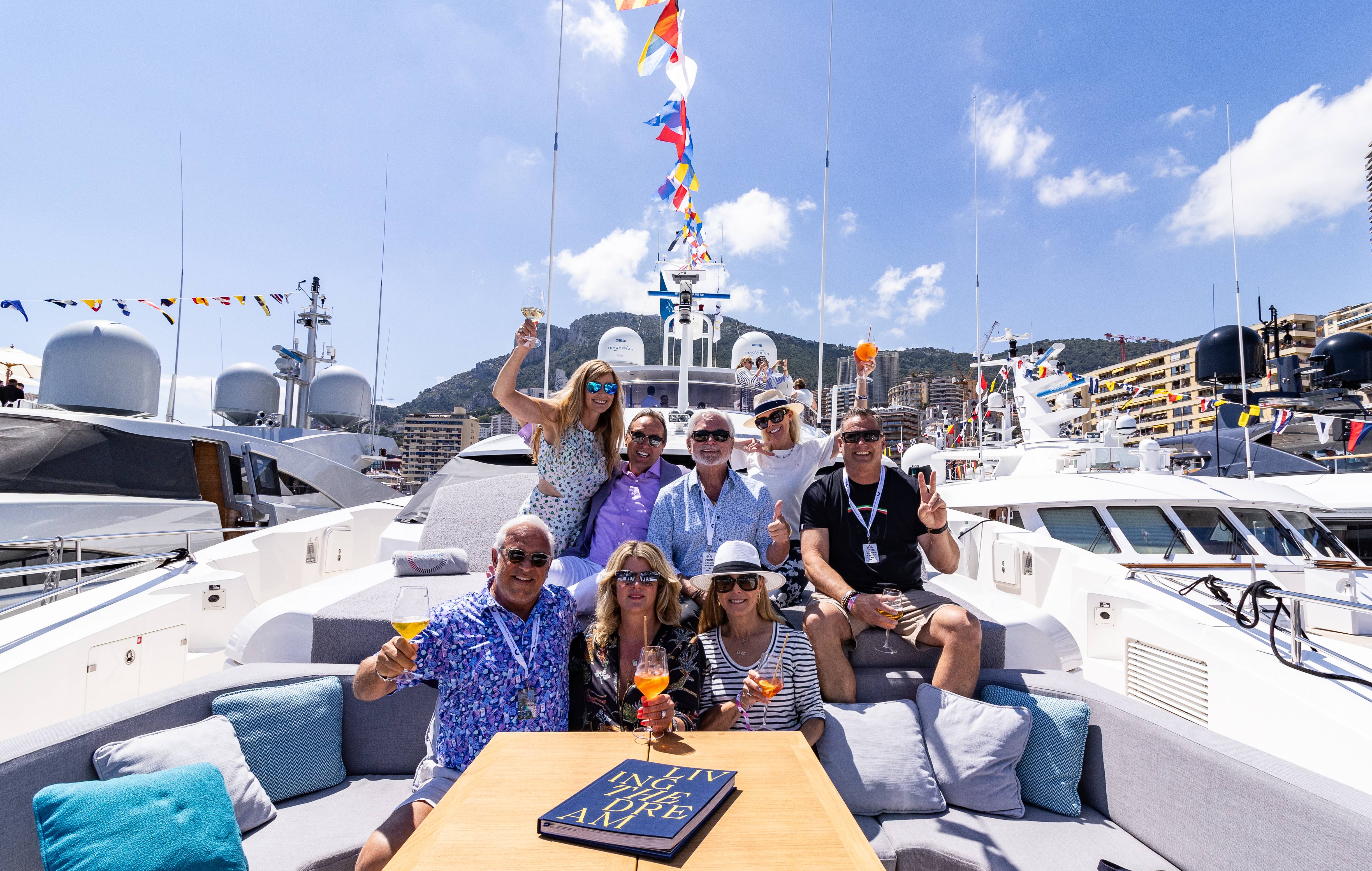 A group of Exclusive Resorts Members on a yacht in Monaco.