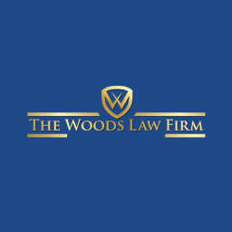 The Woods Law Firm logo