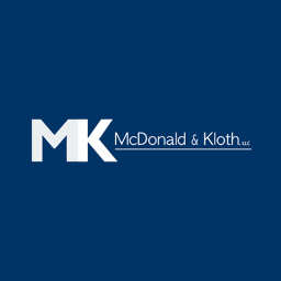 McDonald & Kloth, LLC logo