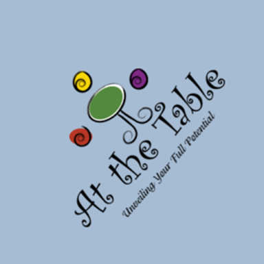 At The Table Inc. logo
