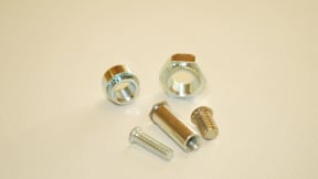 Captive screws and sleeve bushings for metal panels
