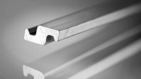 Complete line for the production of profile and flat hose wire