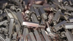 Hexagonal white galvanized steel and nickel-plated brass spacers
